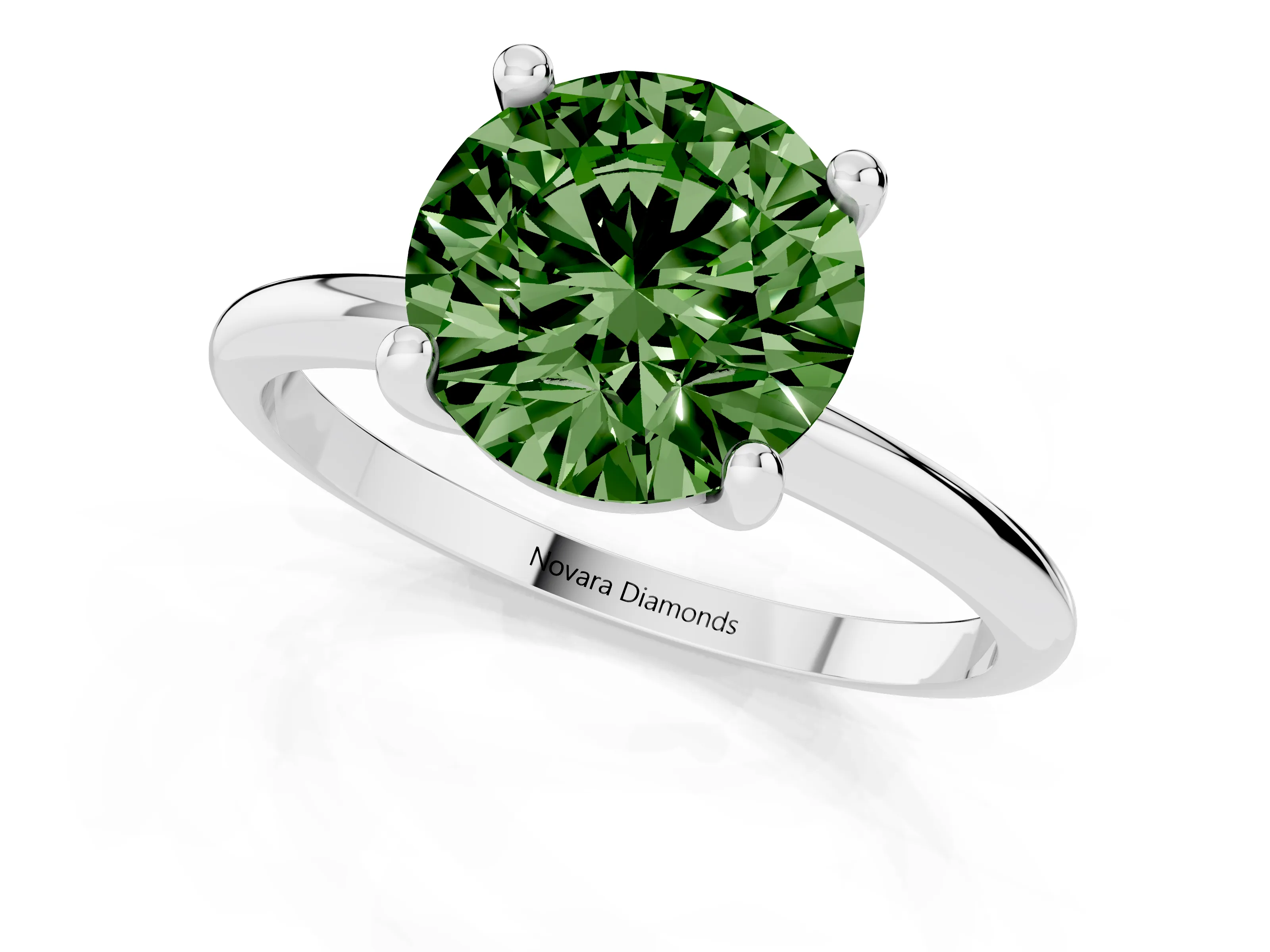 Fancy Green Round Cut Diamond Solitaire Ring Set in Silver with Secure Prong Setting on a Classic Band