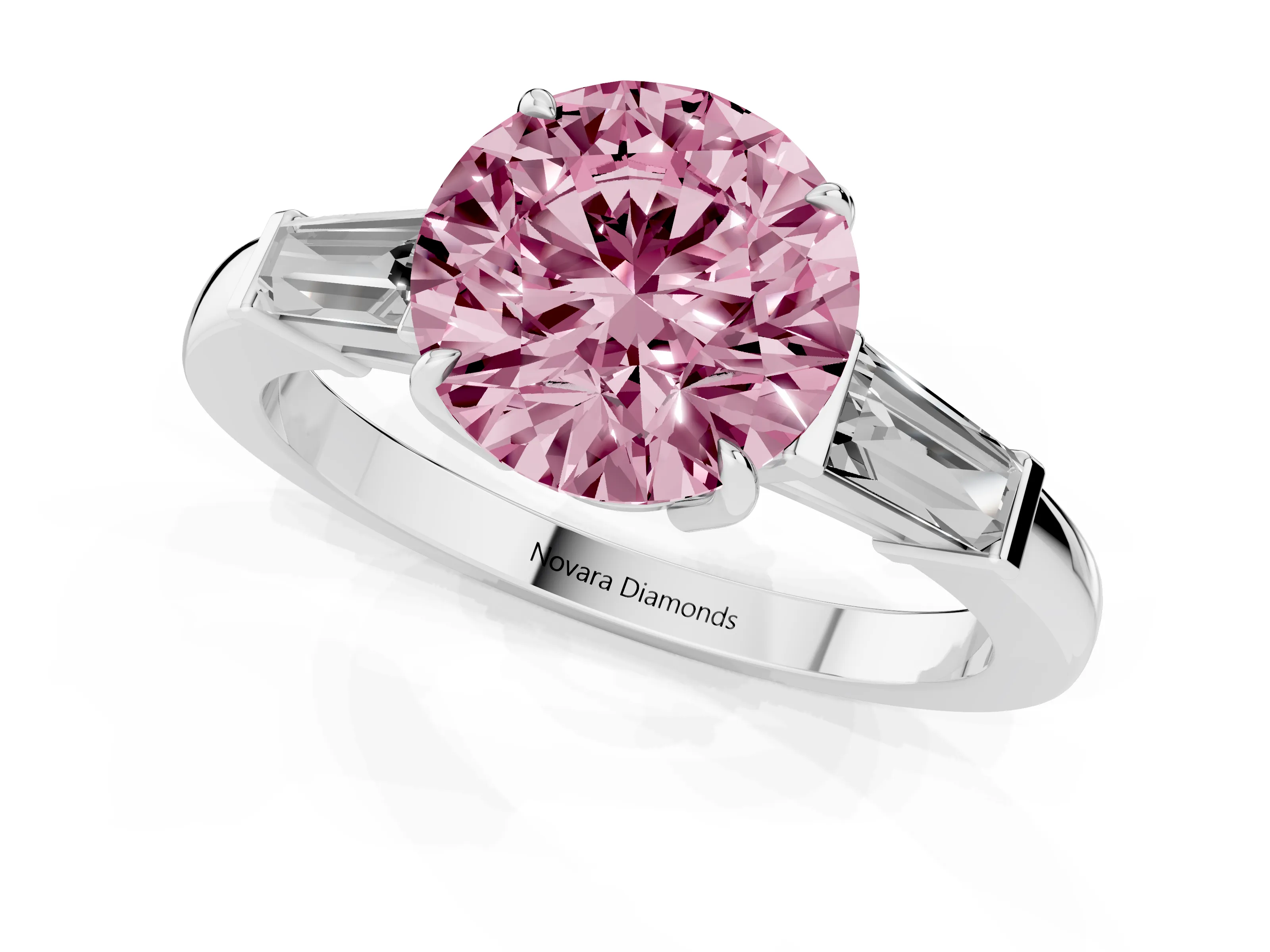 Fancy Pink Round Cut Diamond Three-Stone Ring Set in White gold with Tapered Baguette Side Stones and Prong Setting