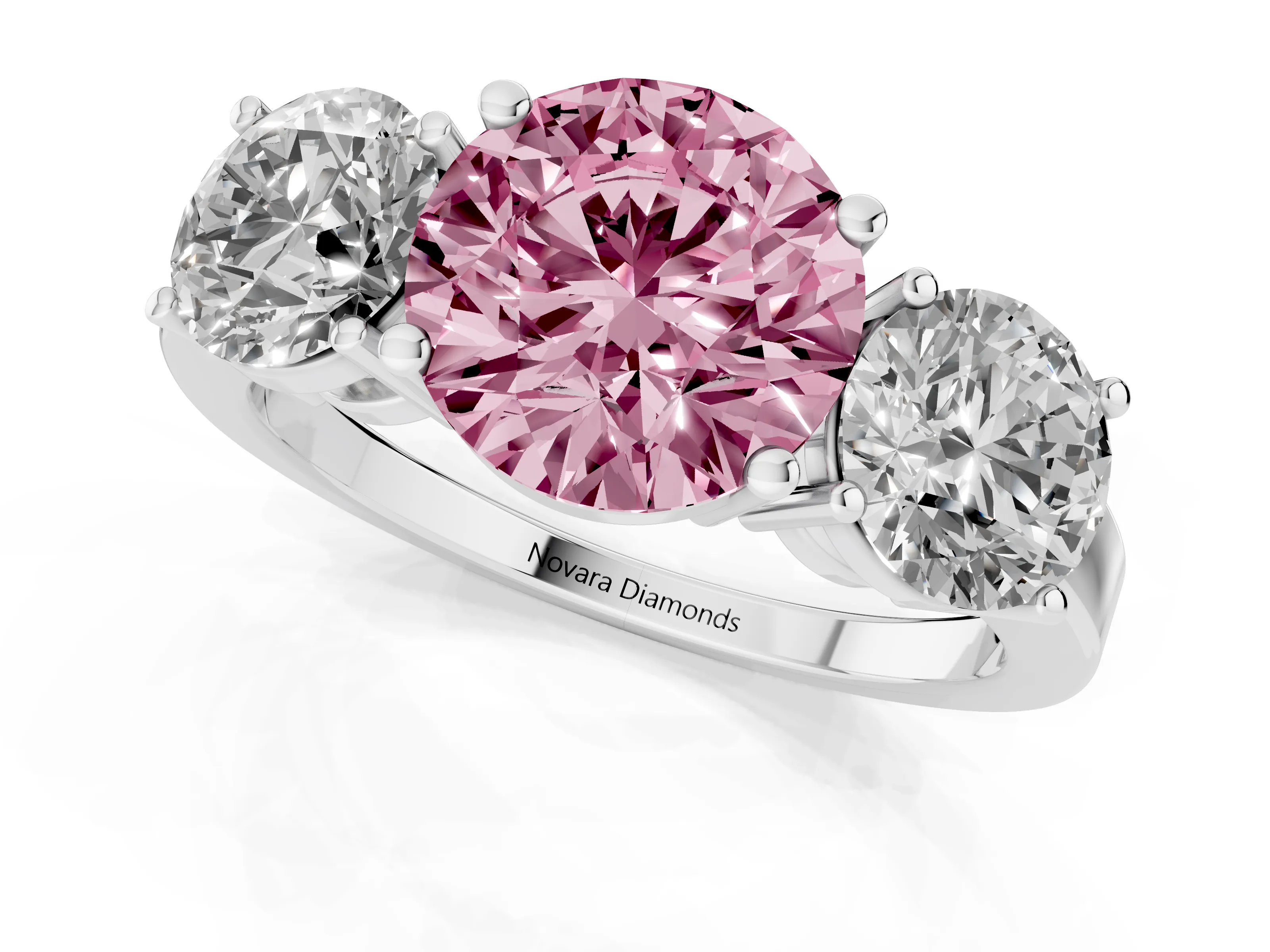 Fancy Pink Round Cut Diamond Three-Stone Engagement Ring Set in Platinum with Flat Band