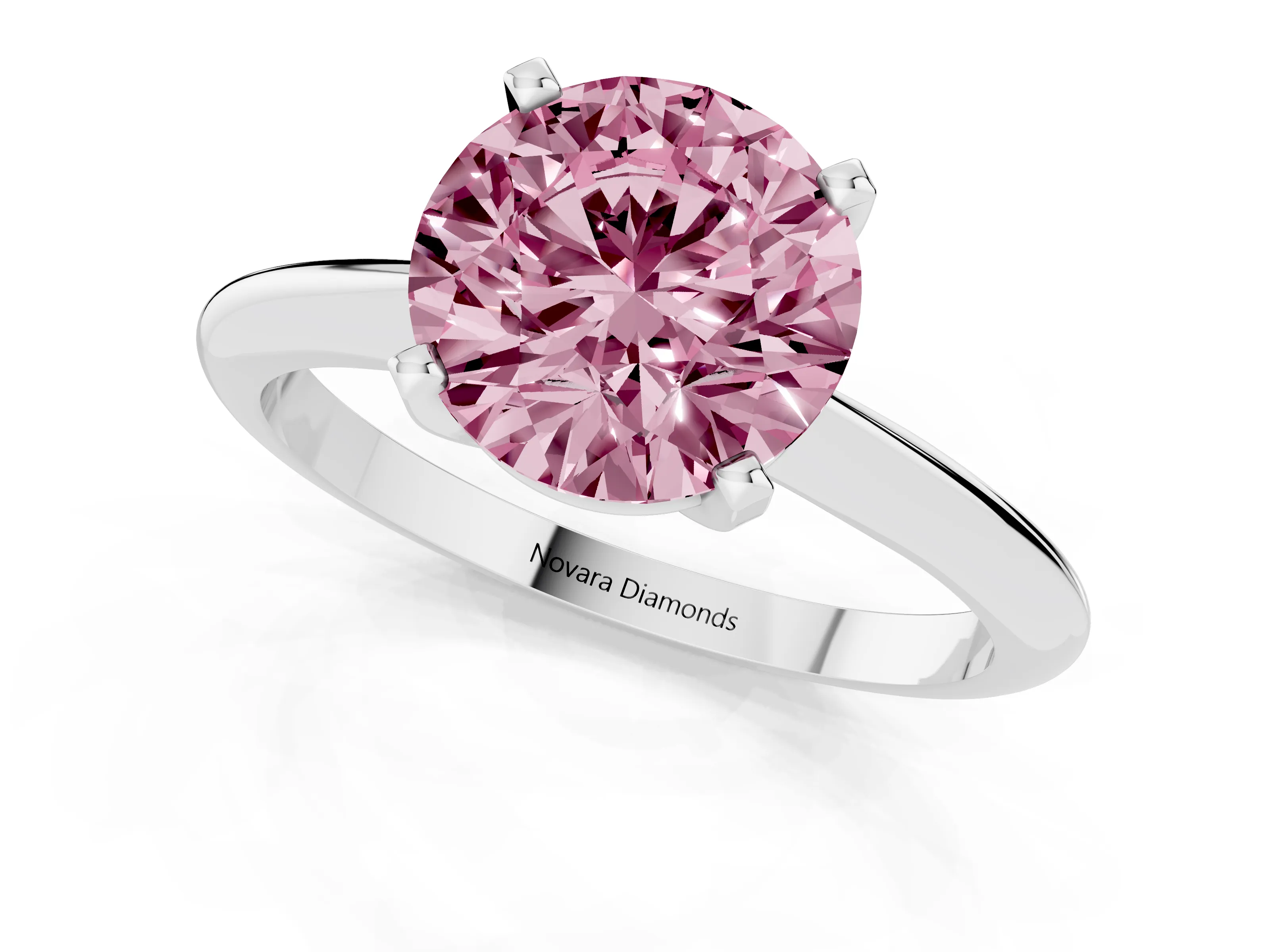 Fancy Pink Round Cut Diamond Solitaire Ring Set in Platinum with Prong Setting on a Plain Round Band