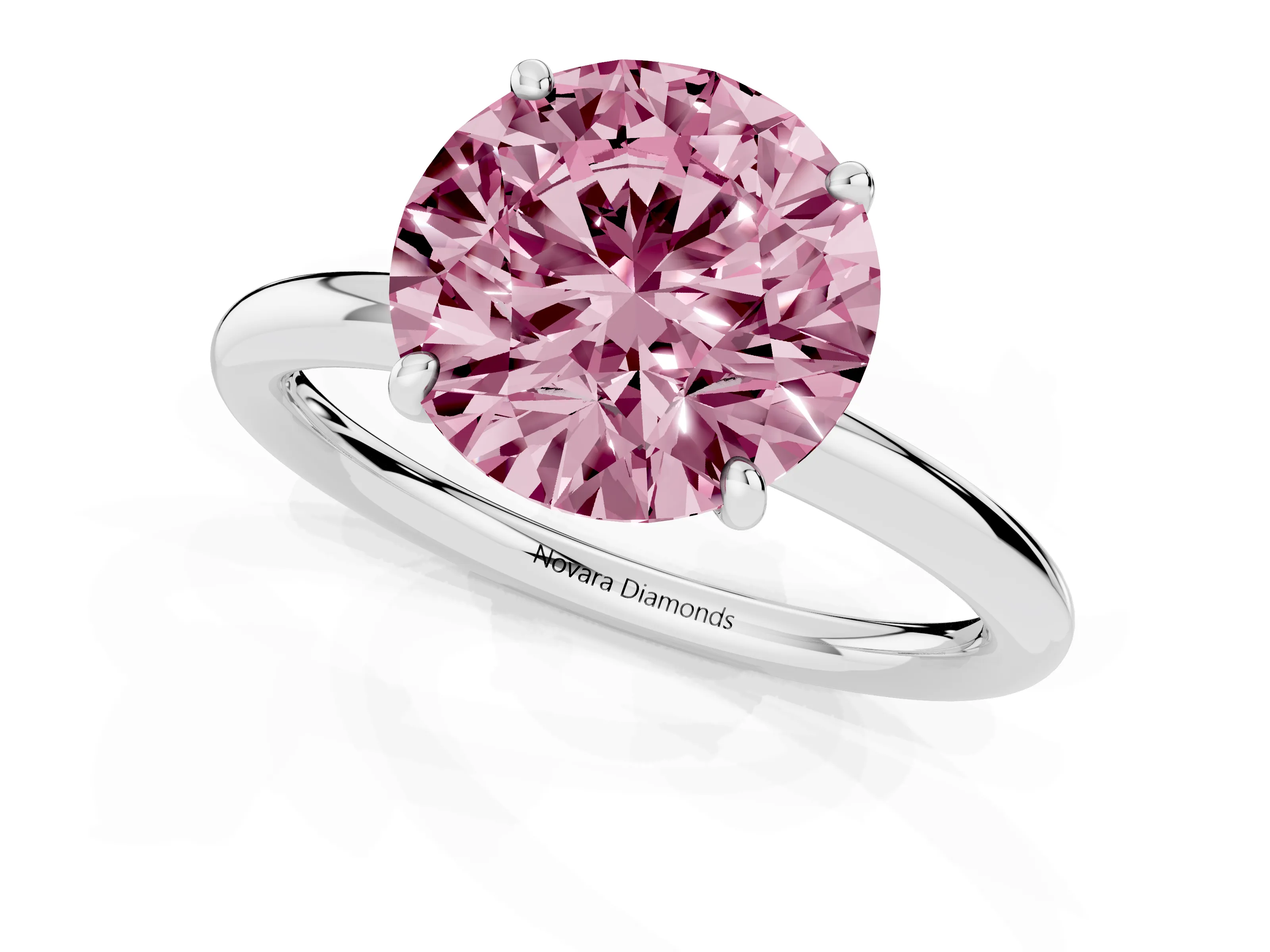 Fancy Pink Round Cut Diamond Solitaire Ring Set in Platinum with Prong Setting on a Polished Plain Band