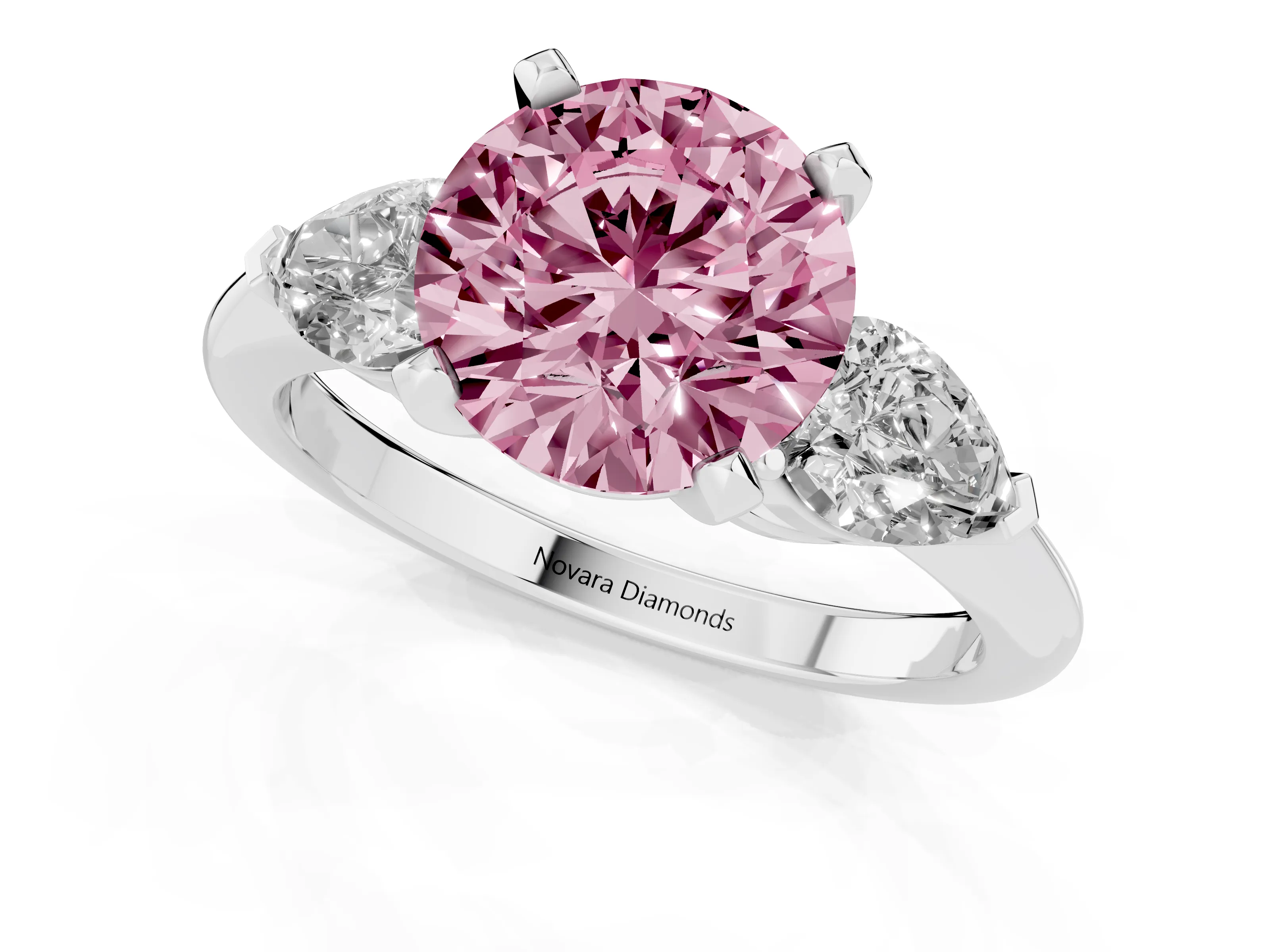Fancy Pink Three-Stone Round Cut Diamond Ring Set in Silver with Pear Side Stones and Prong Setting