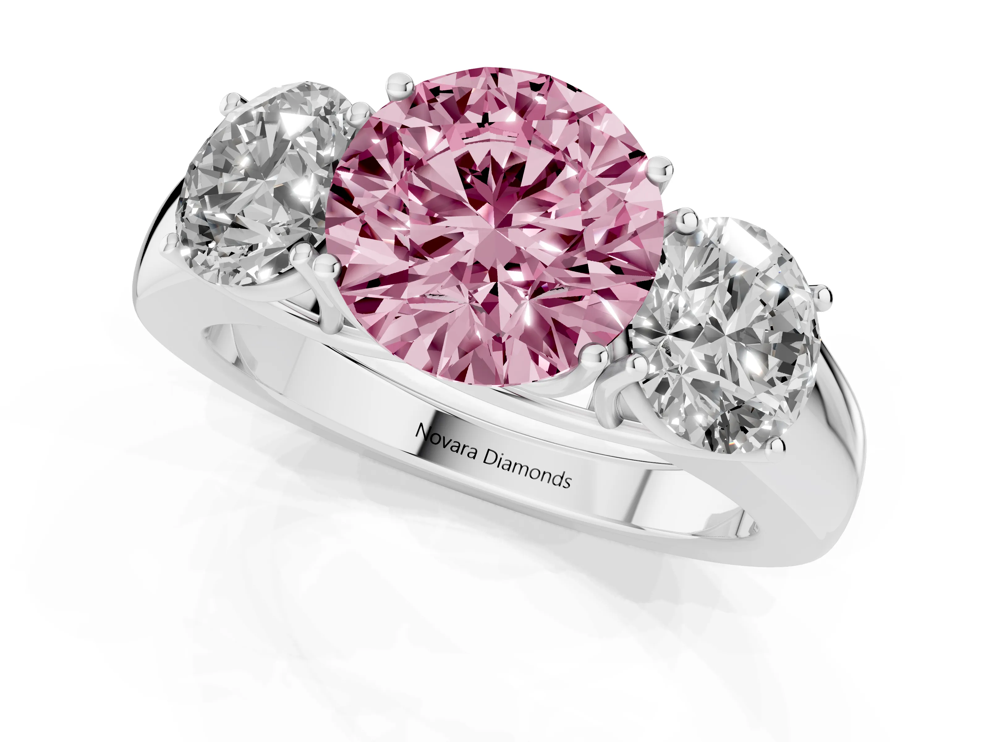 Fancy Pink Three-Stone Round Cut Diamond Ring Set in White gold with Matching Prong Settings and Plain Band