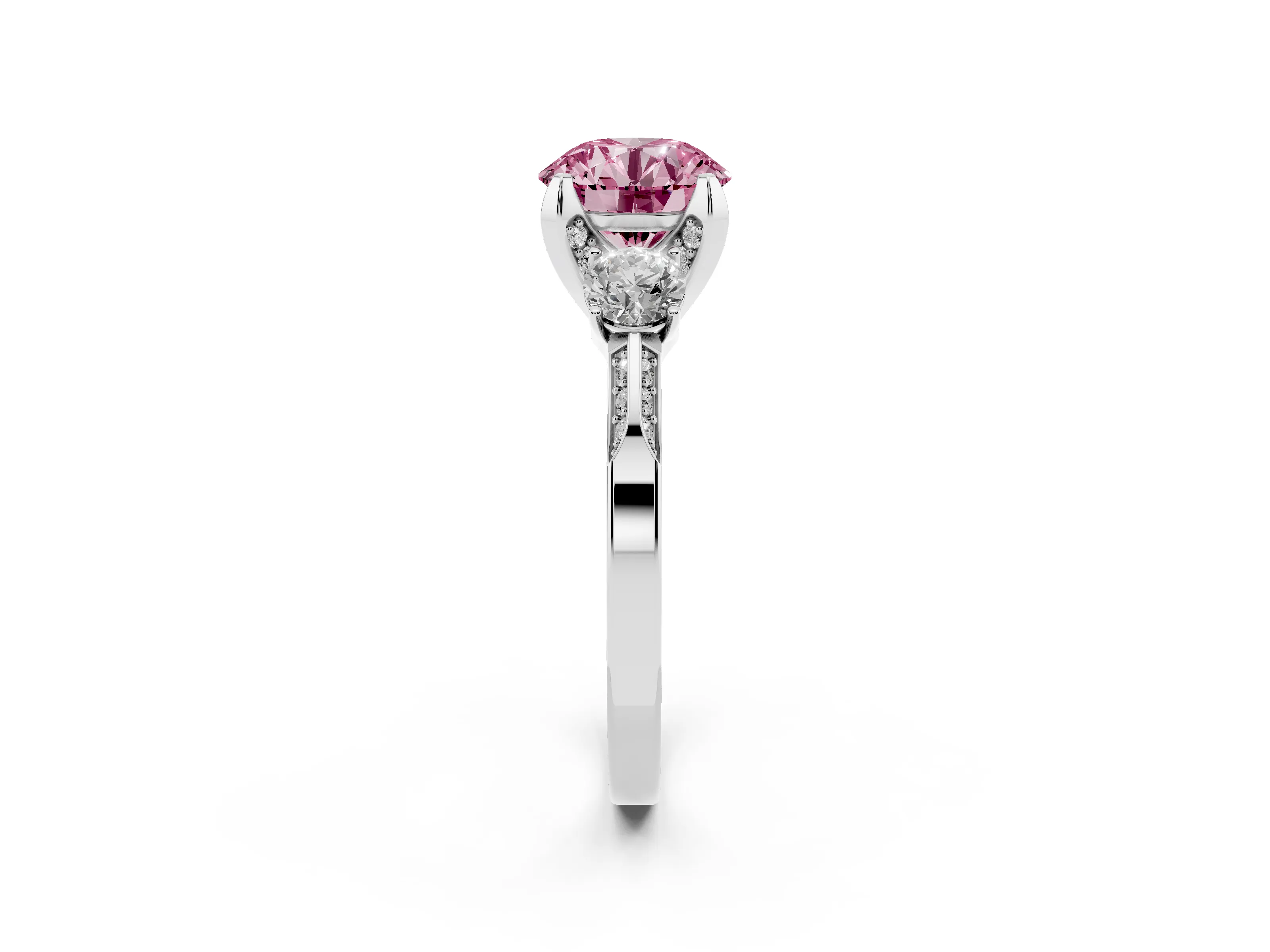 Fancy Pink Round Cut Diamond Three-Stone Ring Set in Platinum with Pavé Band and Smaller Side Stones