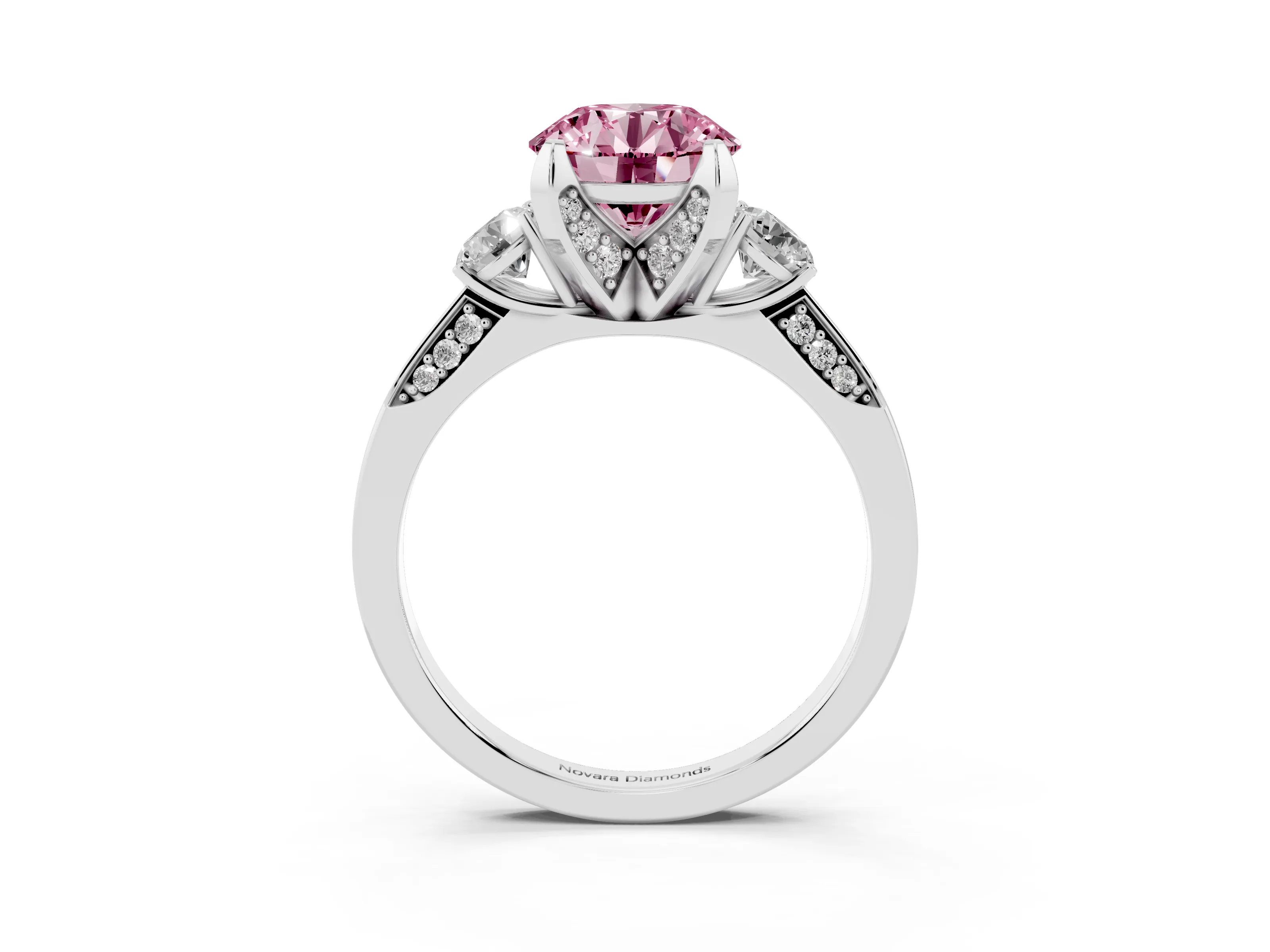 Fancy Pink Round Cut Diamond Three-Stone Ring Set in Platinum with Pavé Band and Smaller Side Stones