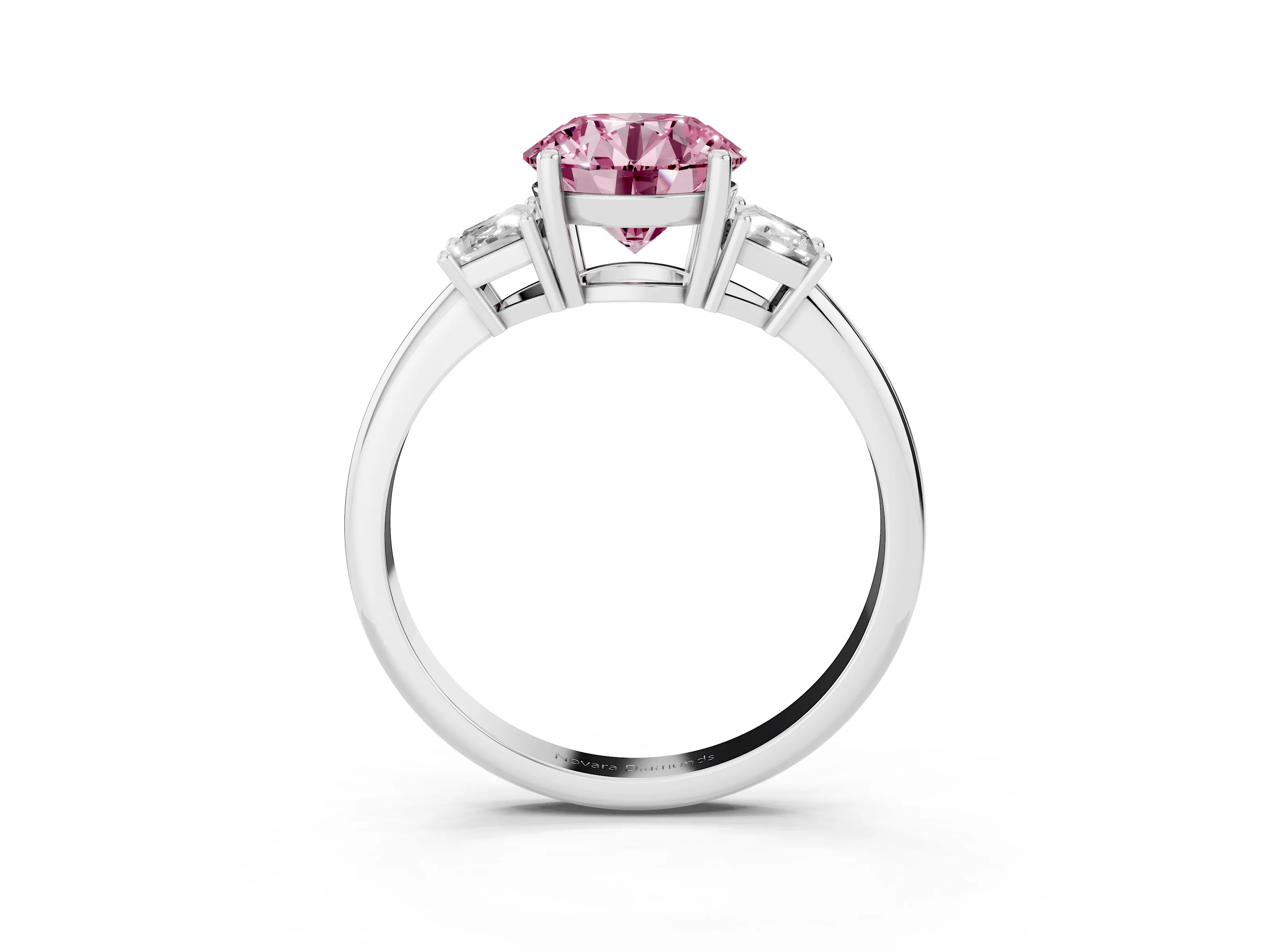 Fancy Pink Round Cut Diamond Three-Stone Ring Set in Platinum with Trapezoid Side Stones and Prong Setting