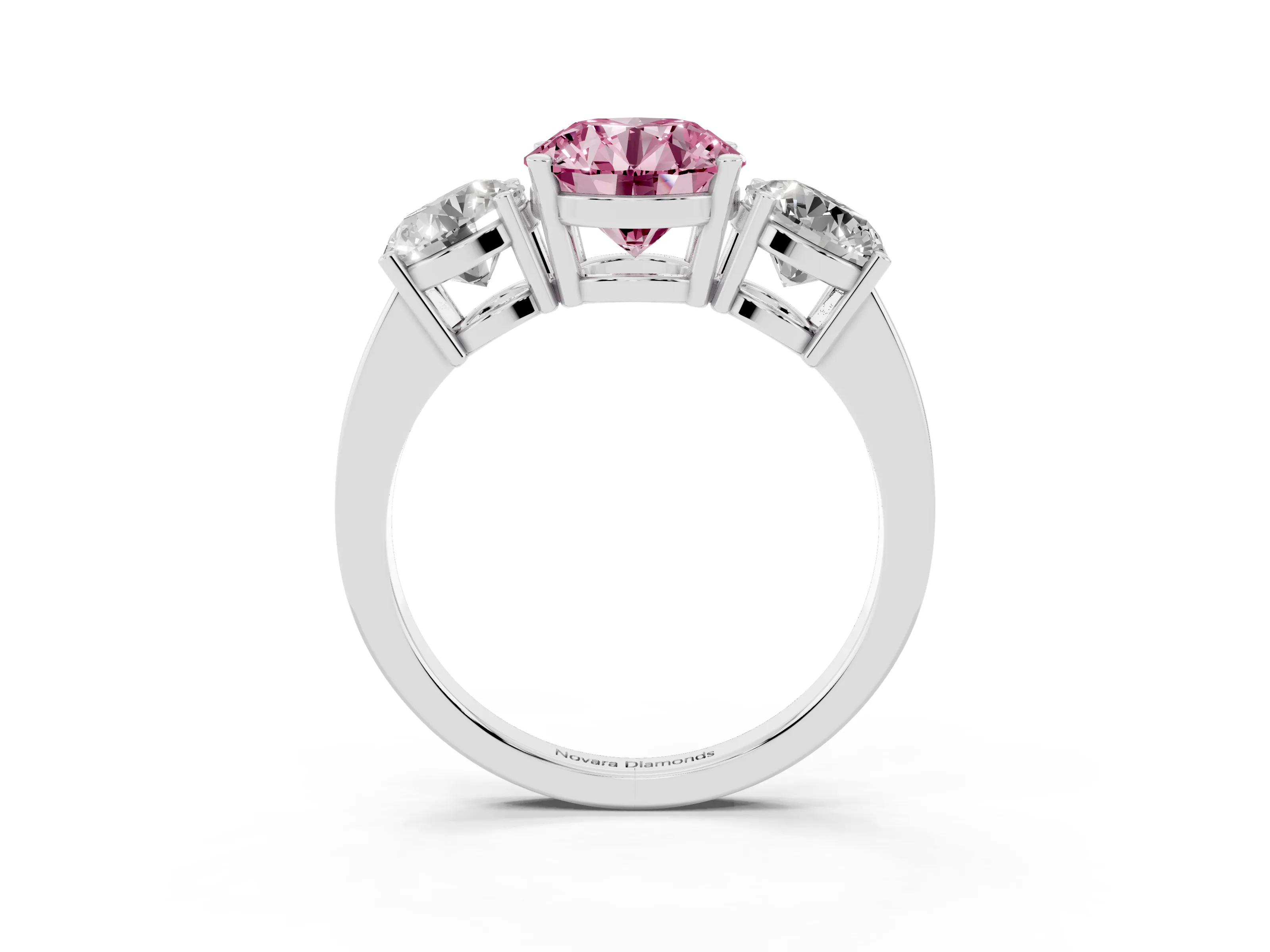 Fancy Pink Round Cut Diamond Three-Stone Engagement Ring Set in Platinum with Flat Band