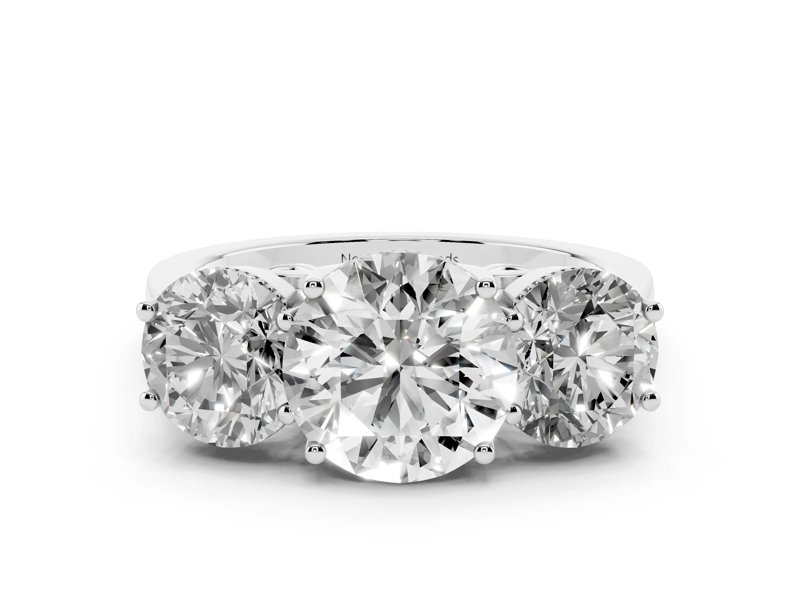 Round Cut Diamond Three-Stone Engagement Ring Set in Silver with Polished Band