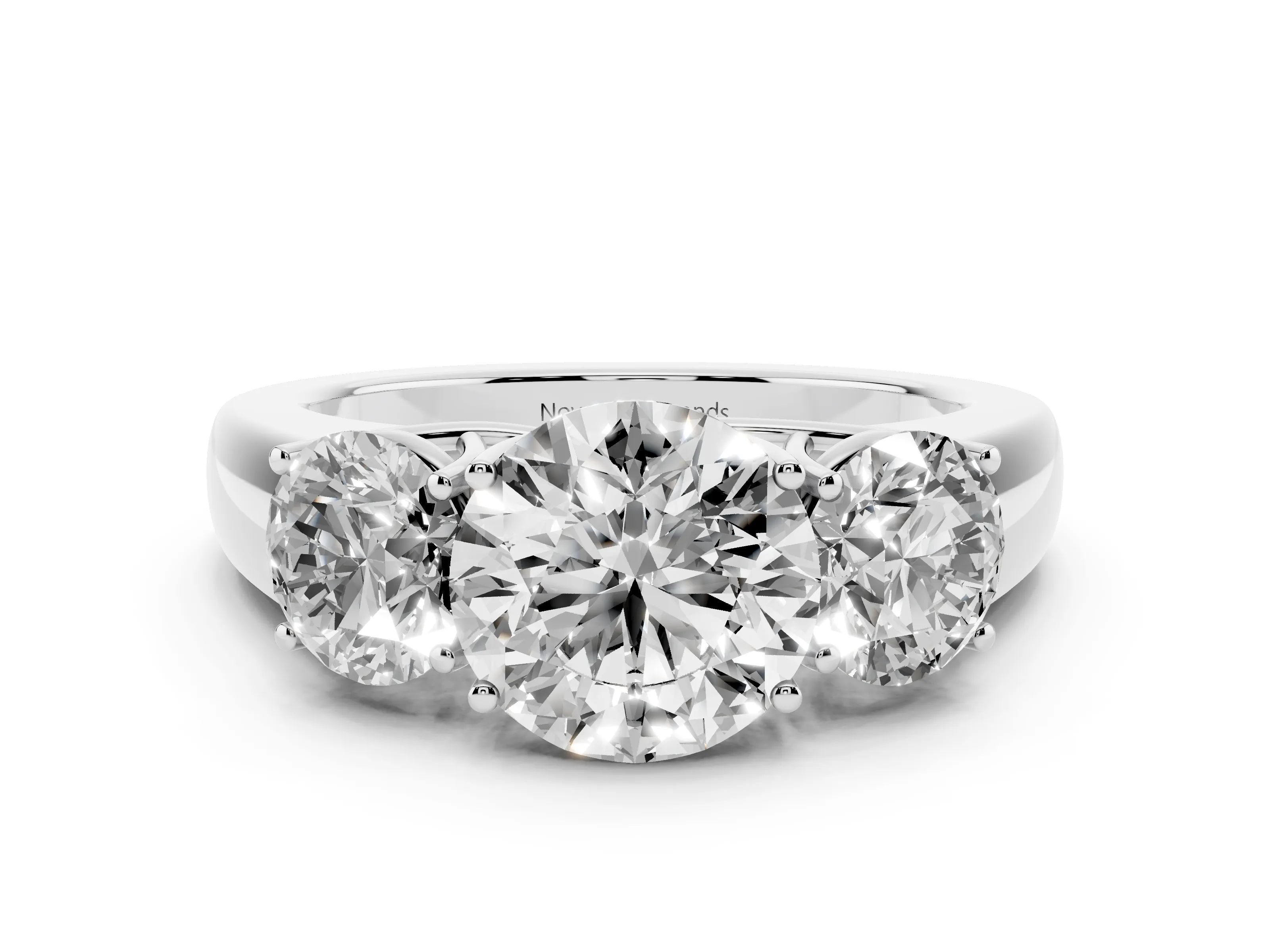 Three-Stone Round Cut Diamond Ring Set in White gold with Matching Prong Settings and Plain Band