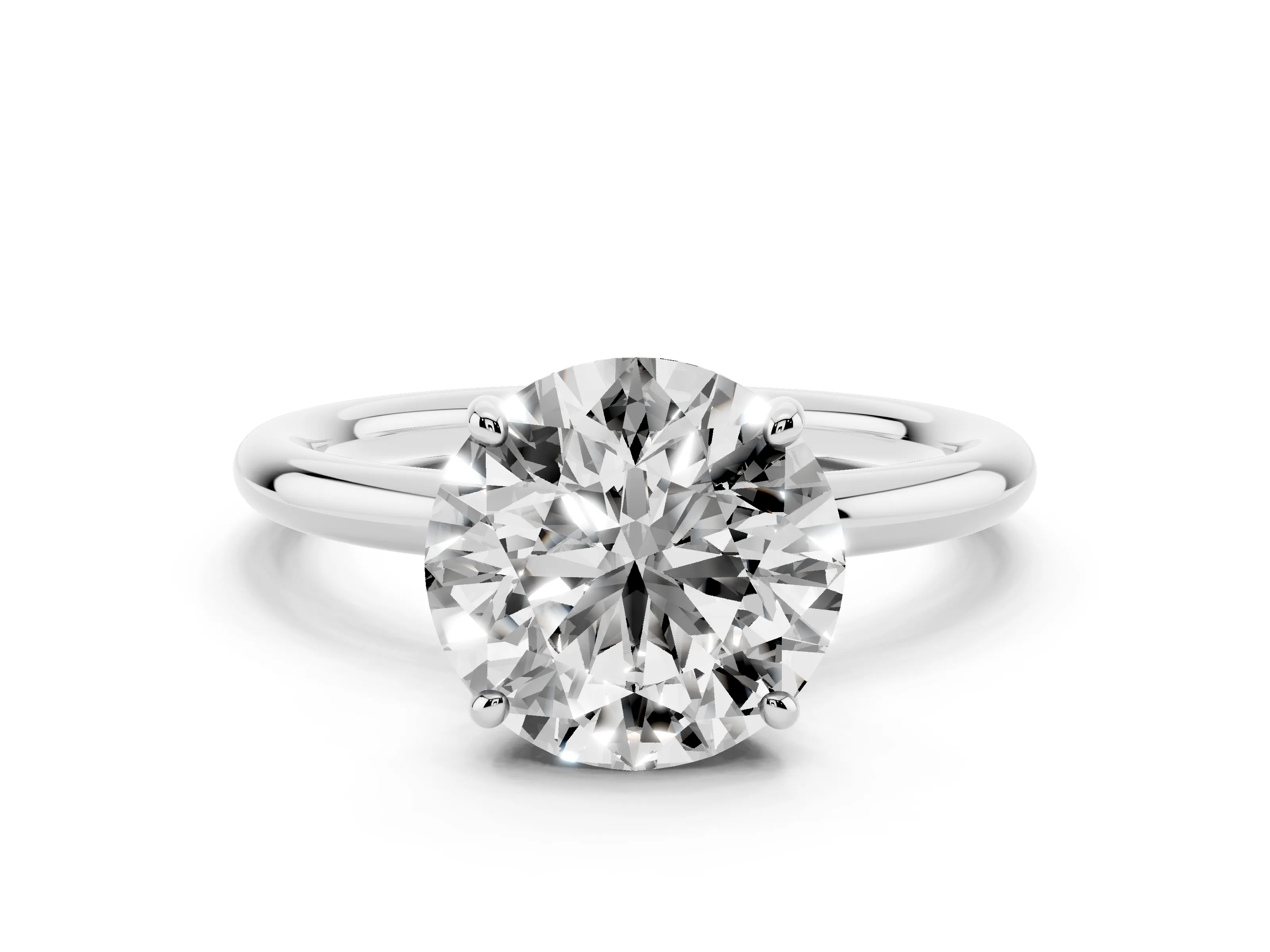 Round Cut Diamond Solitaire Ring Set in White gold with Prong Setting on a Polished Plain Band
