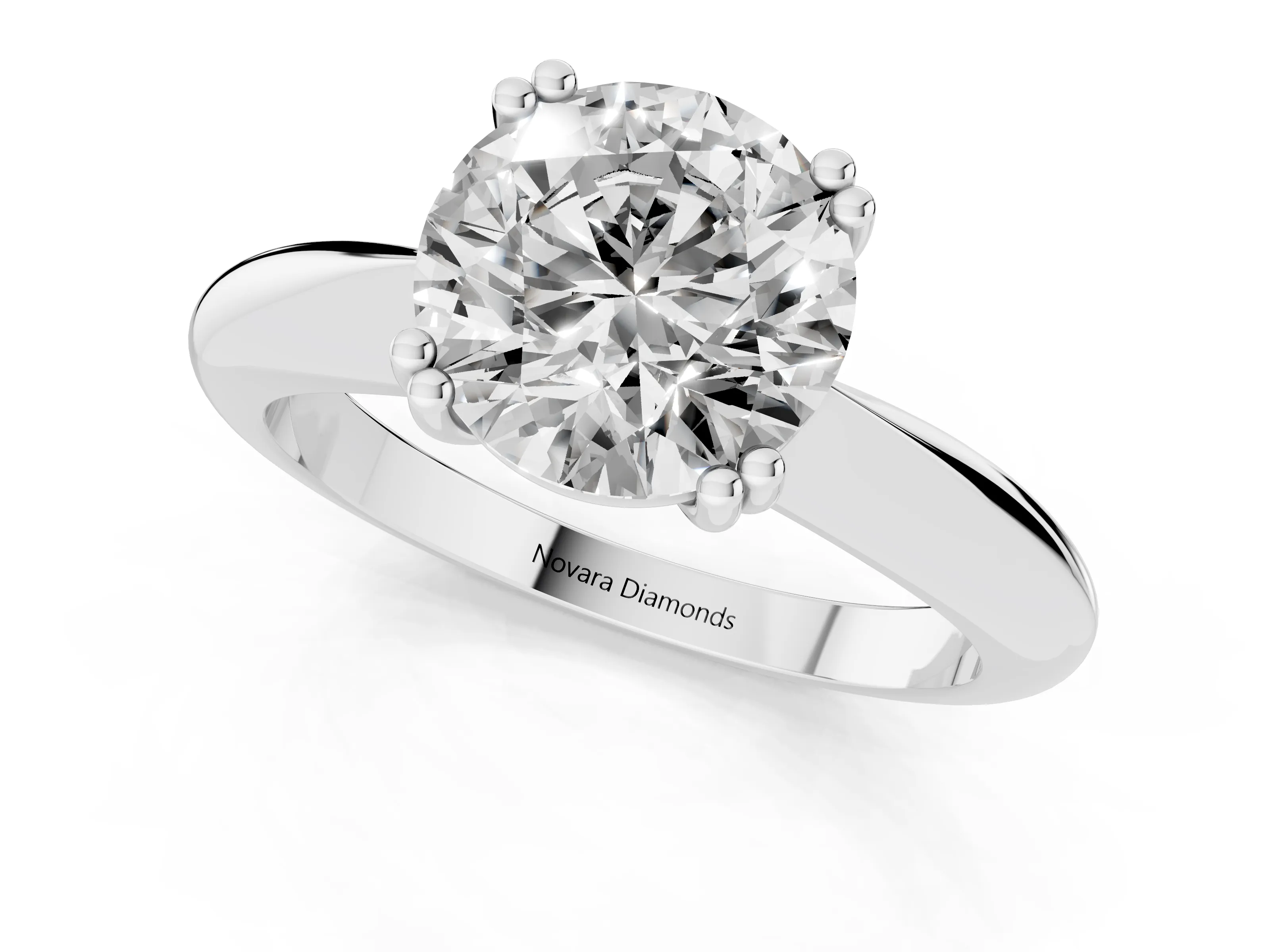 Round Cut Diamond Solitaire Engagement Ring Set in White gold with Tapered Band and Prong Setting – second view