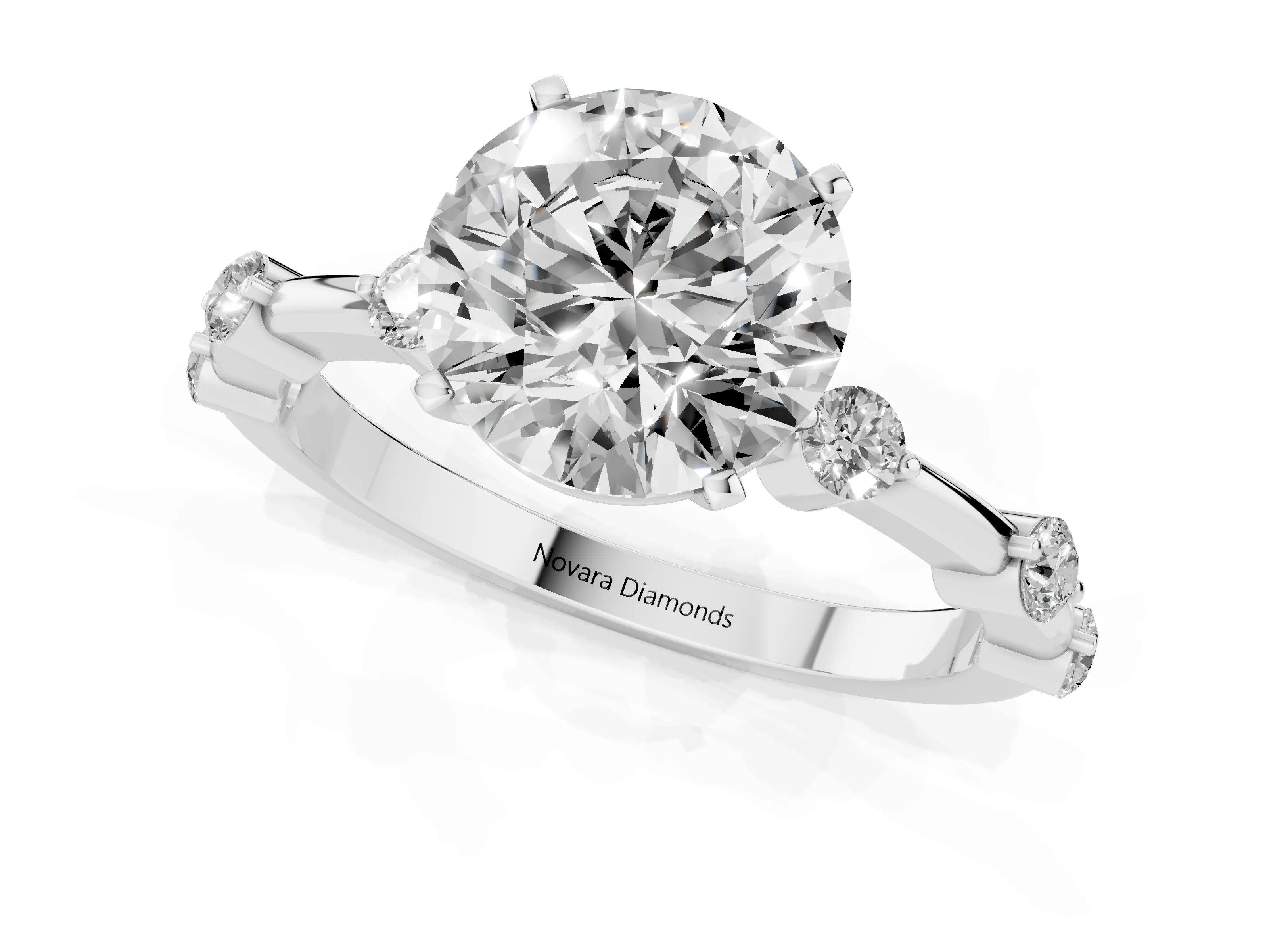 Round Cut Diamond Solitaire Ring Set in Platinum with Bezel Set Side Stones and Prong Setting