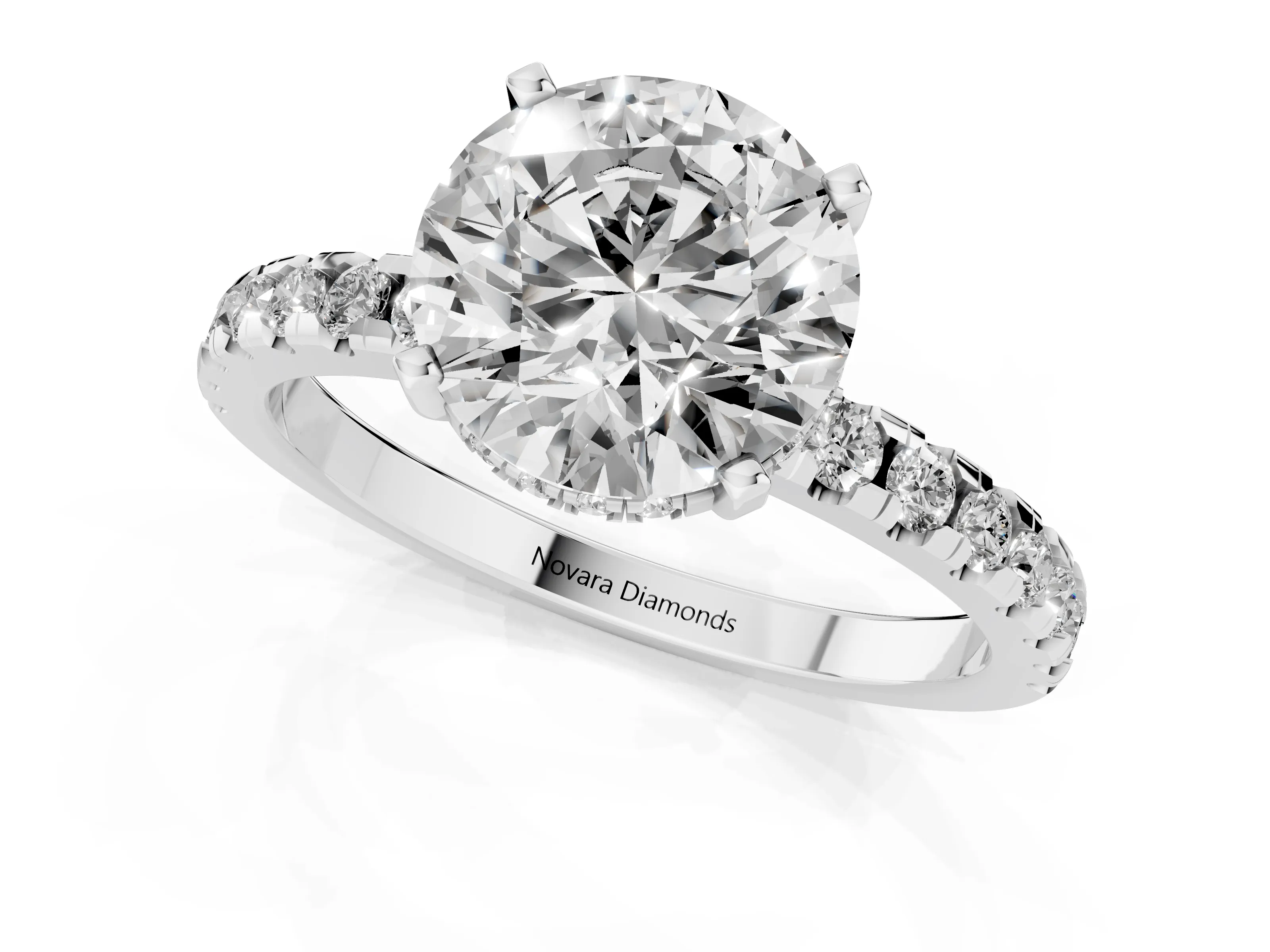 Round Cut Diamond Pavé Solitaire Ring Set in Silver with Round Band Accents and Prong Setting