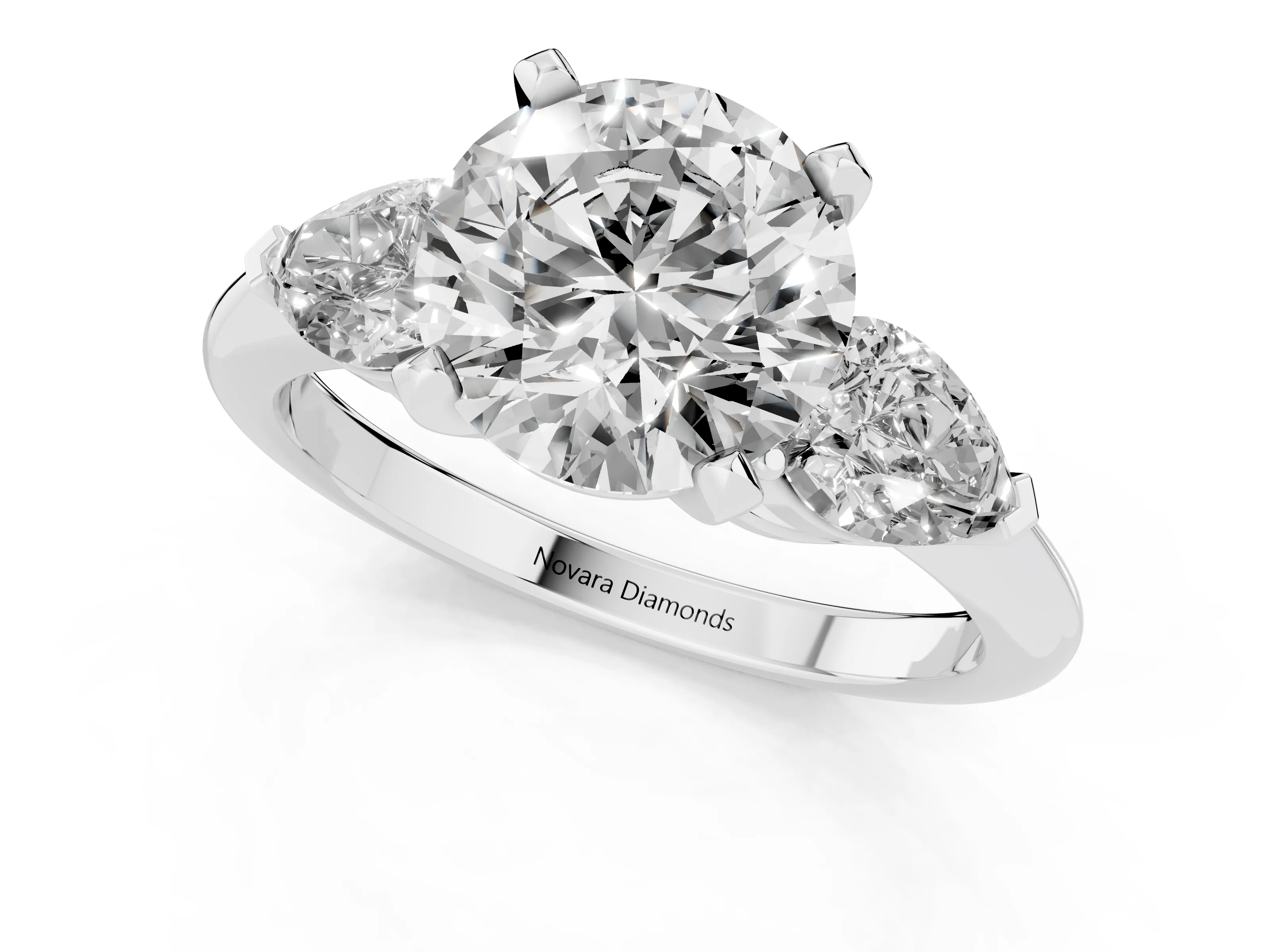 Three-Stone Round Cut Diamond Ring Set in Silver with Pear Side Stones and Prong Setting