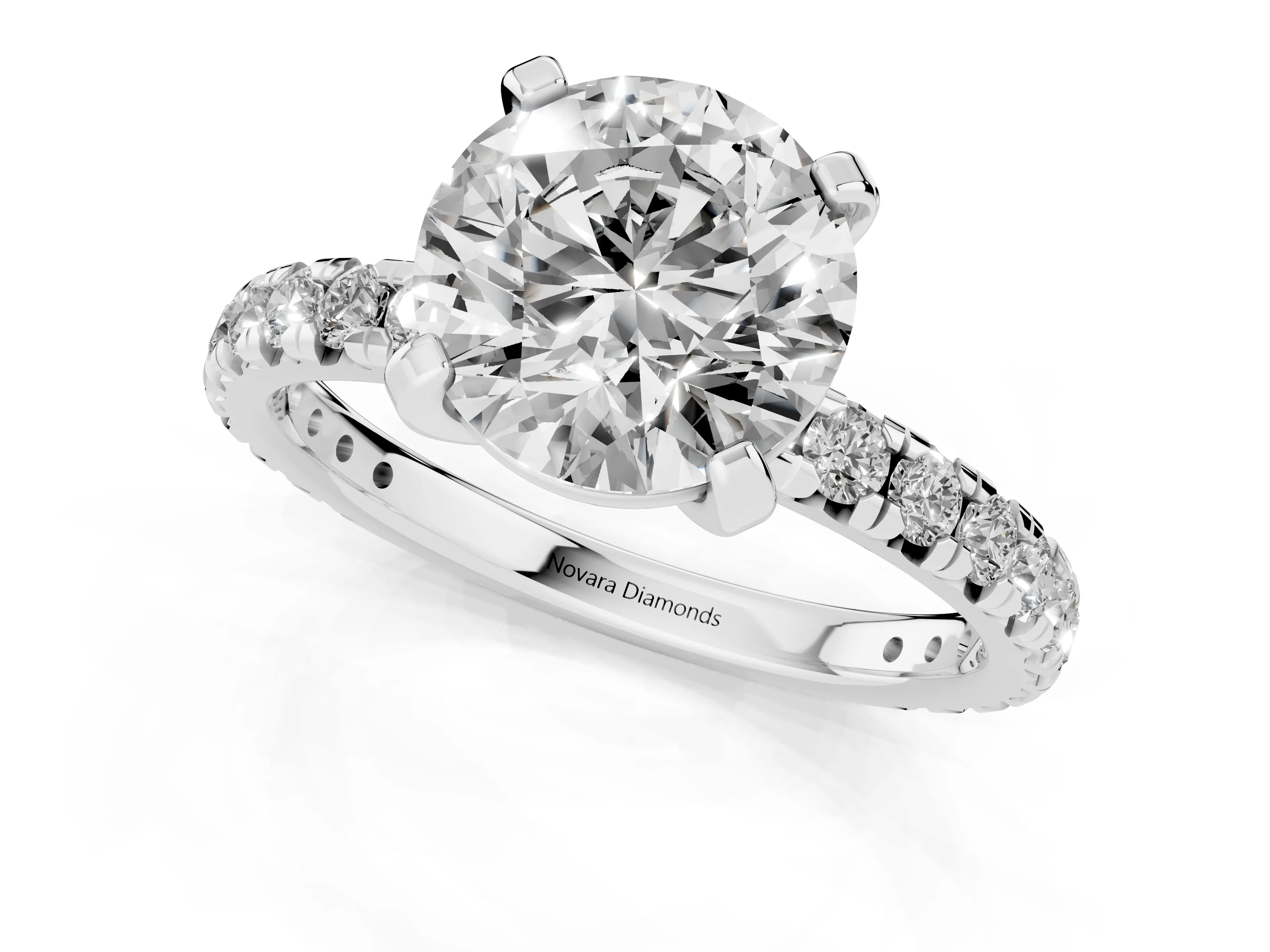 Round Cut Diamond Pavé Solitaire Ring Set in White gold with Round Band and Prong Setting