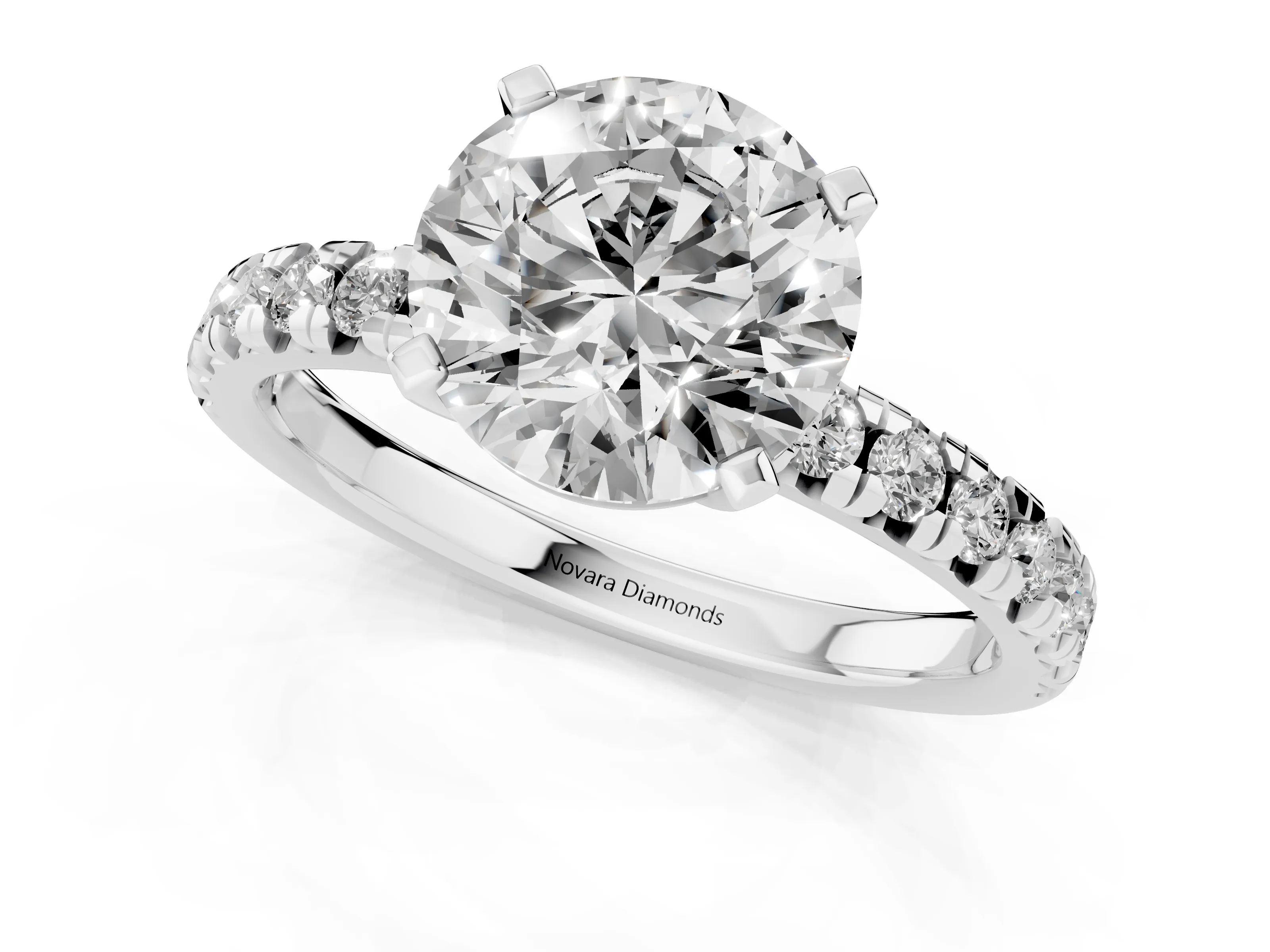 Round Cut Diamond Solitaire Pavé Engagement Ring Set in White gold with Round Band and Prong Setting