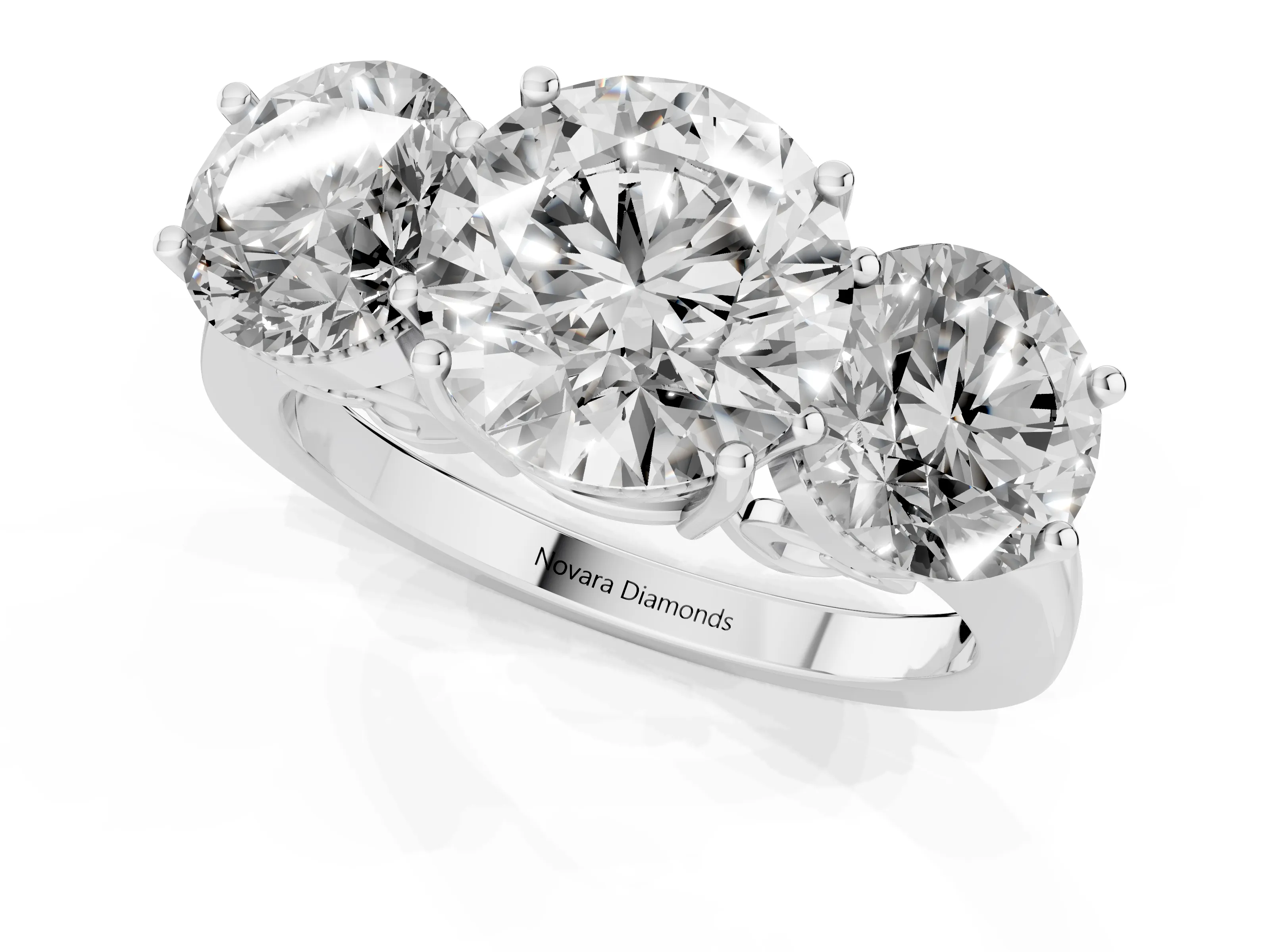 Round Cut Diamond Three-Stone Engagement Ring Set in Silver with Polished Band