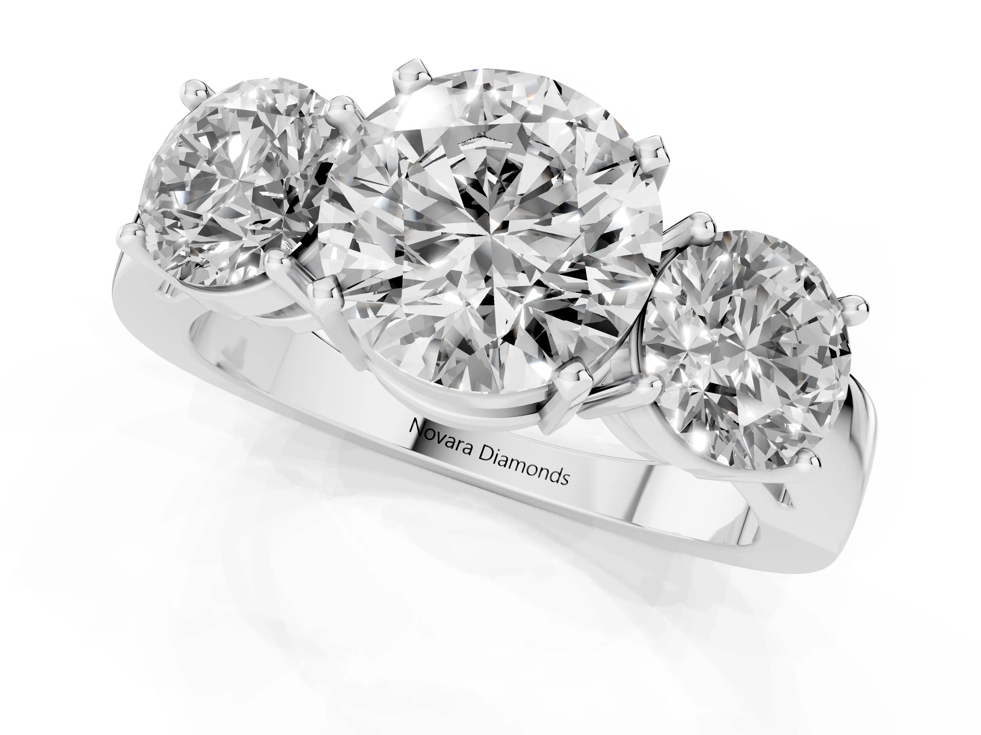 Round Cut Diamond Three-Stone Ring Set in White gold with Round Side Stones and Classic Band