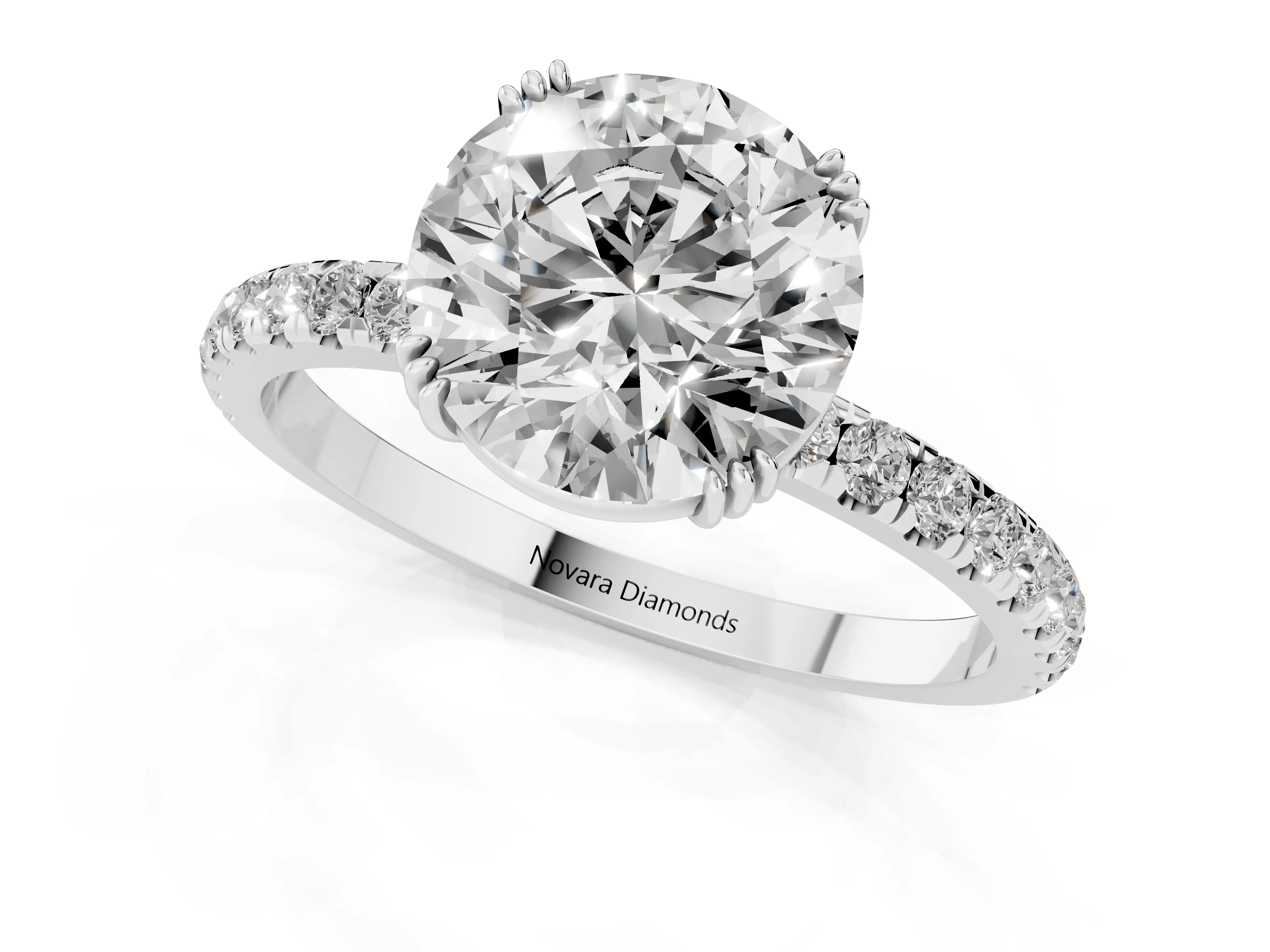 Round Cut Diamond Brilliant Solitaire Set in Silver with Pavé Band and Claw Prong Setting