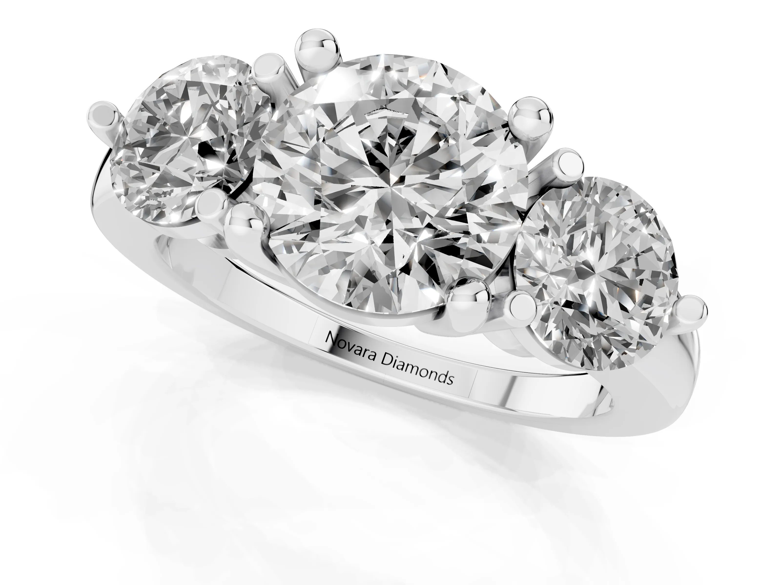 Round Cut Diamond Three-Stone Ring Set in Silver with Prong Setting and Classic Band