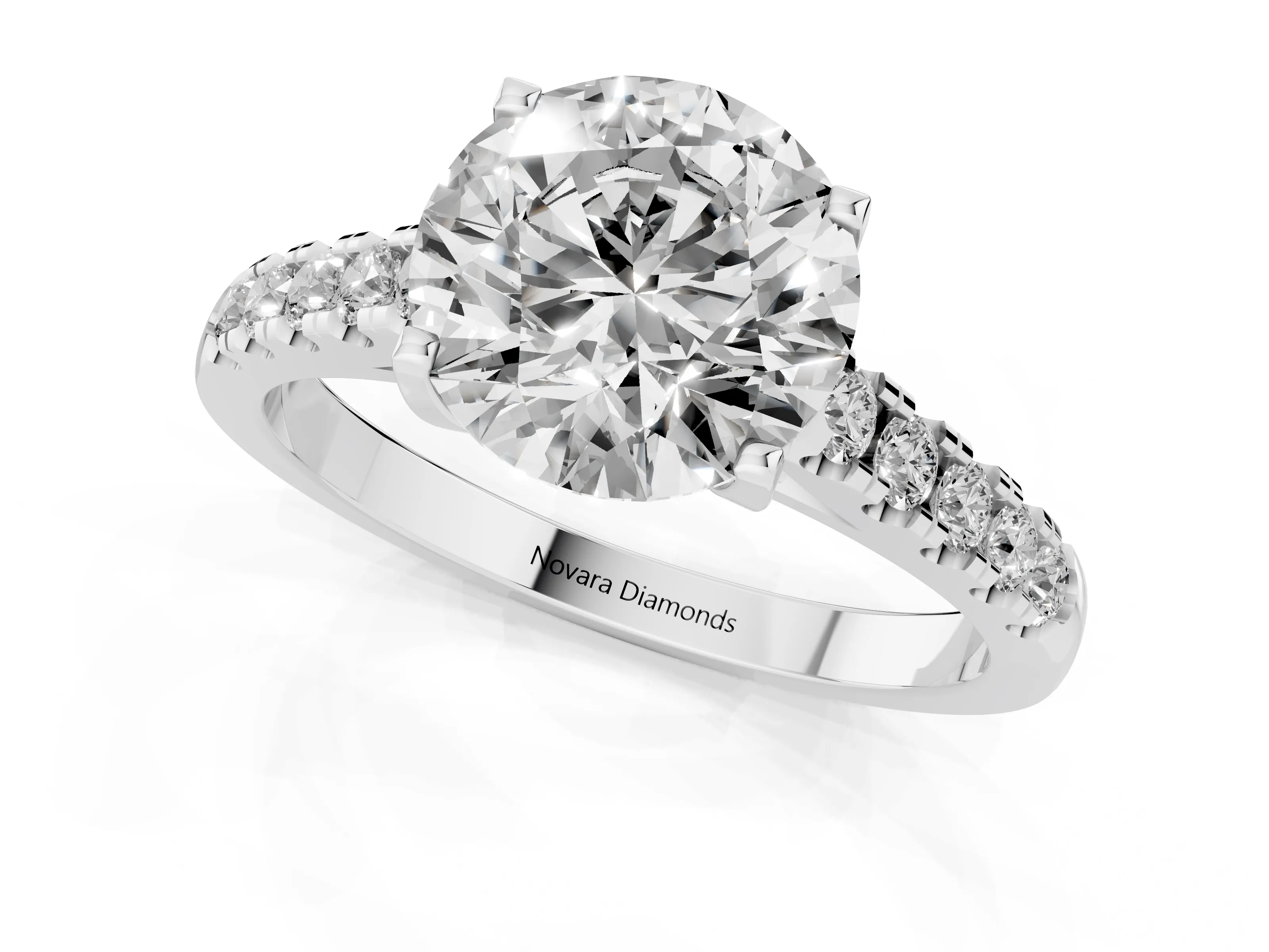 Round Cut Diamond Pavé Band Solitaire Ring Set in White gold with Partway Accent Stones and Prong Setting