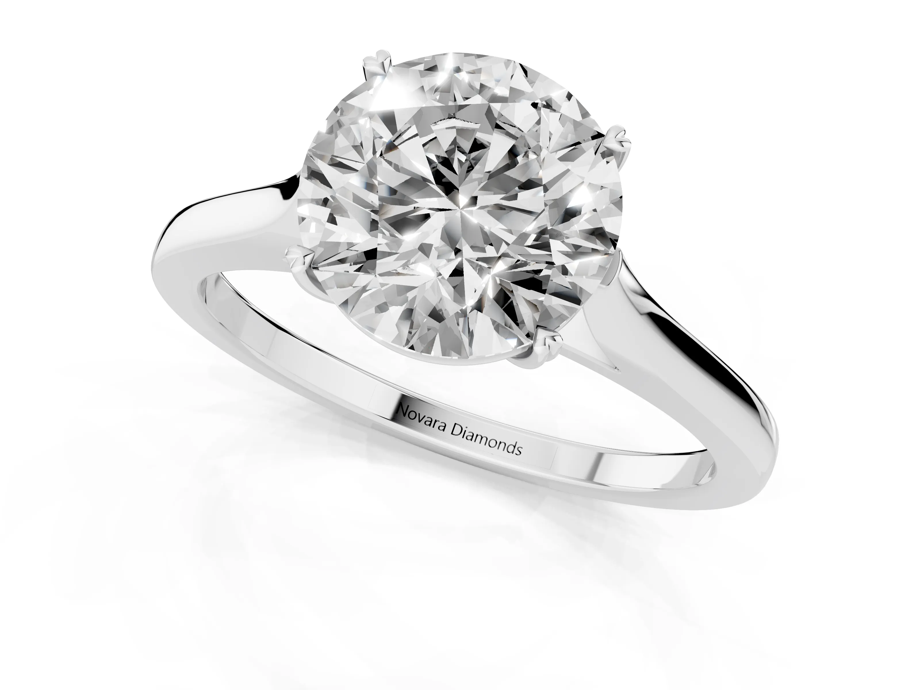 Round Cut Diamond Solitaire Heart Prong Engagement Ring Set in White gold with Tapered Band