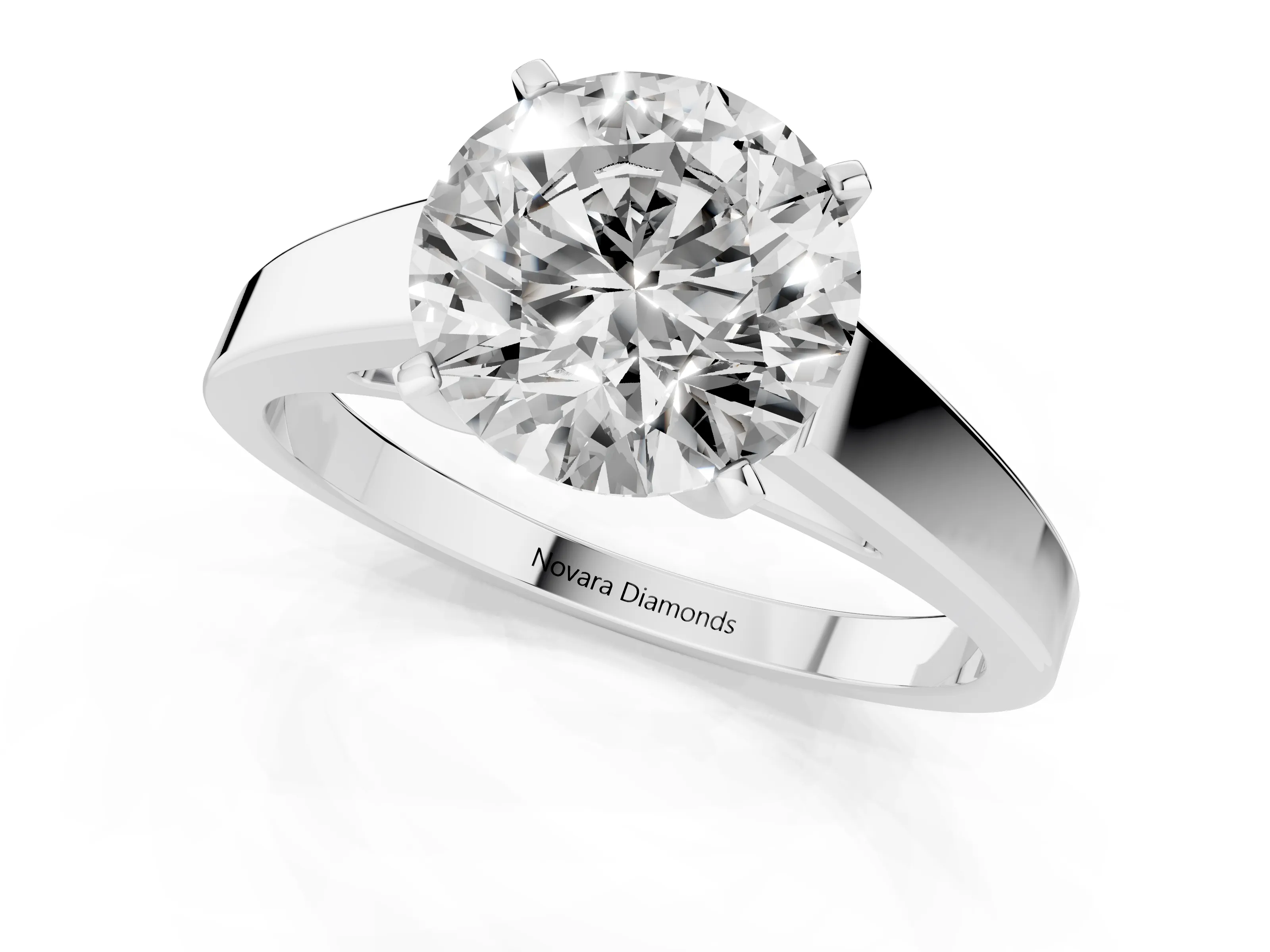 Round Cut Diamond Solitaire Engagement Ring Set in White gold with Prong Setting and Tapered Band