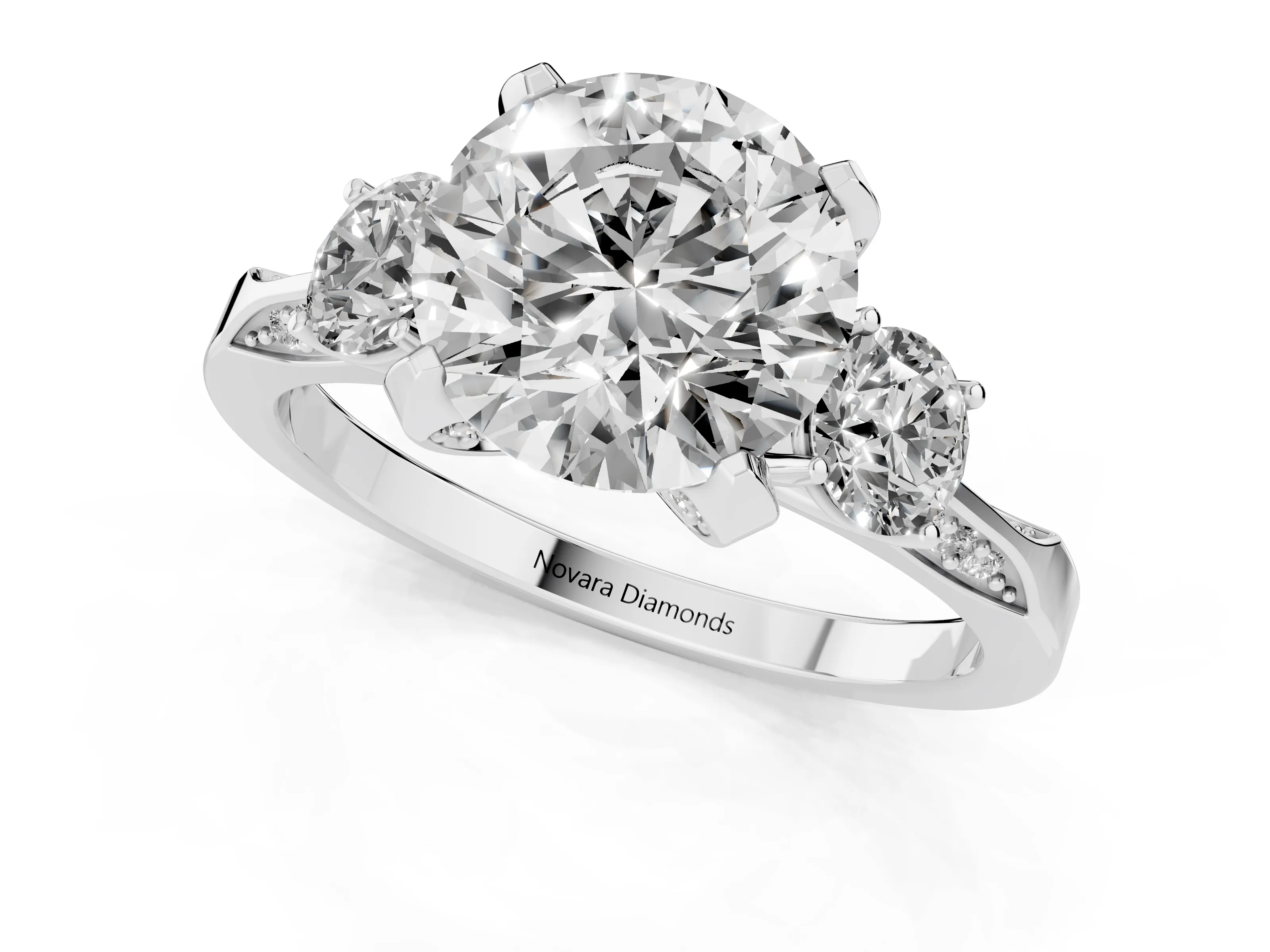 Round Cut Diamond Three-Stone Ring Set in White gold with Pavé Band and Smaller Side Stones – second view