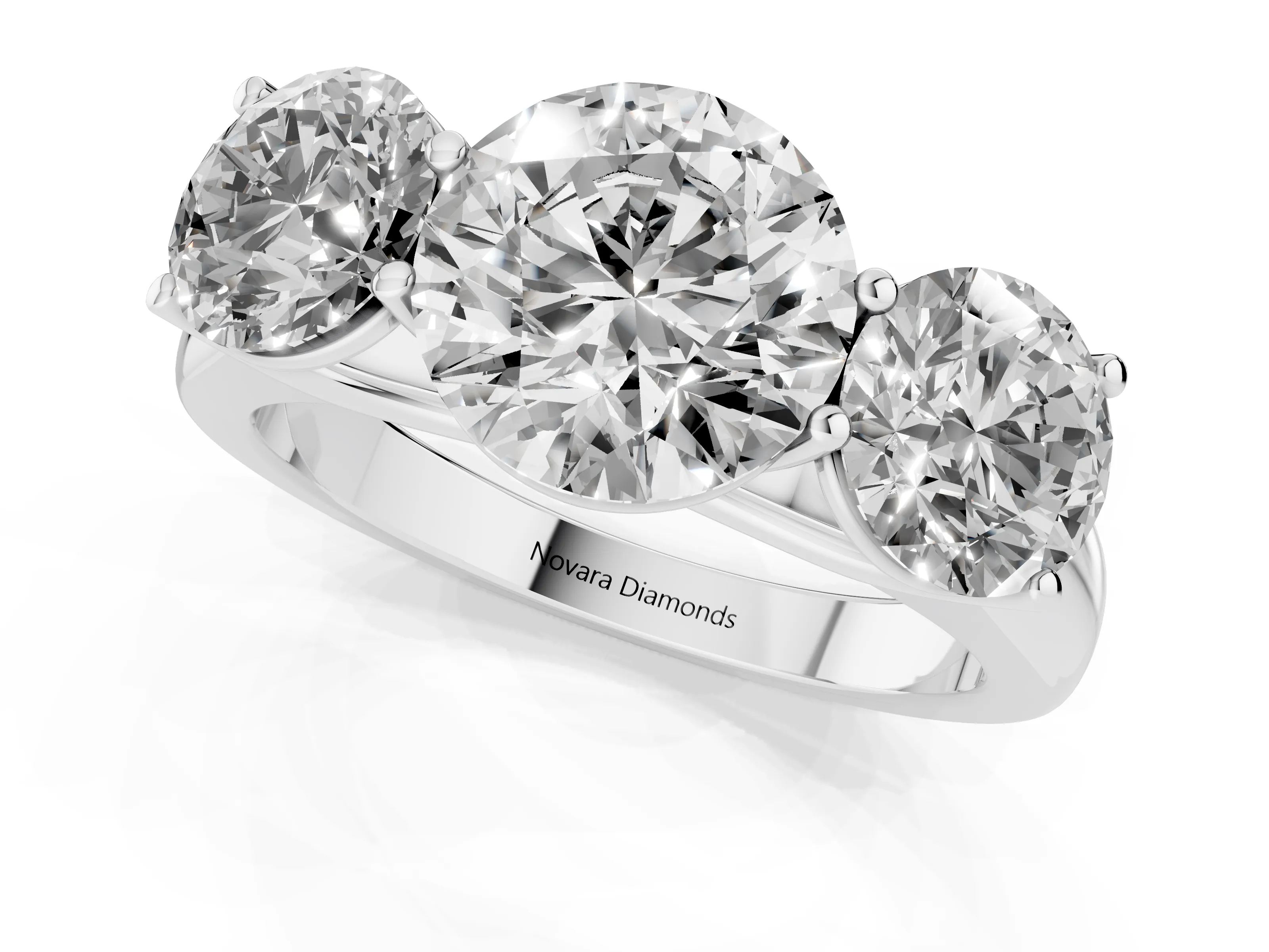 Round Cut Diamond Three-Stone Ring Set in Platinum with Plain Polished Band