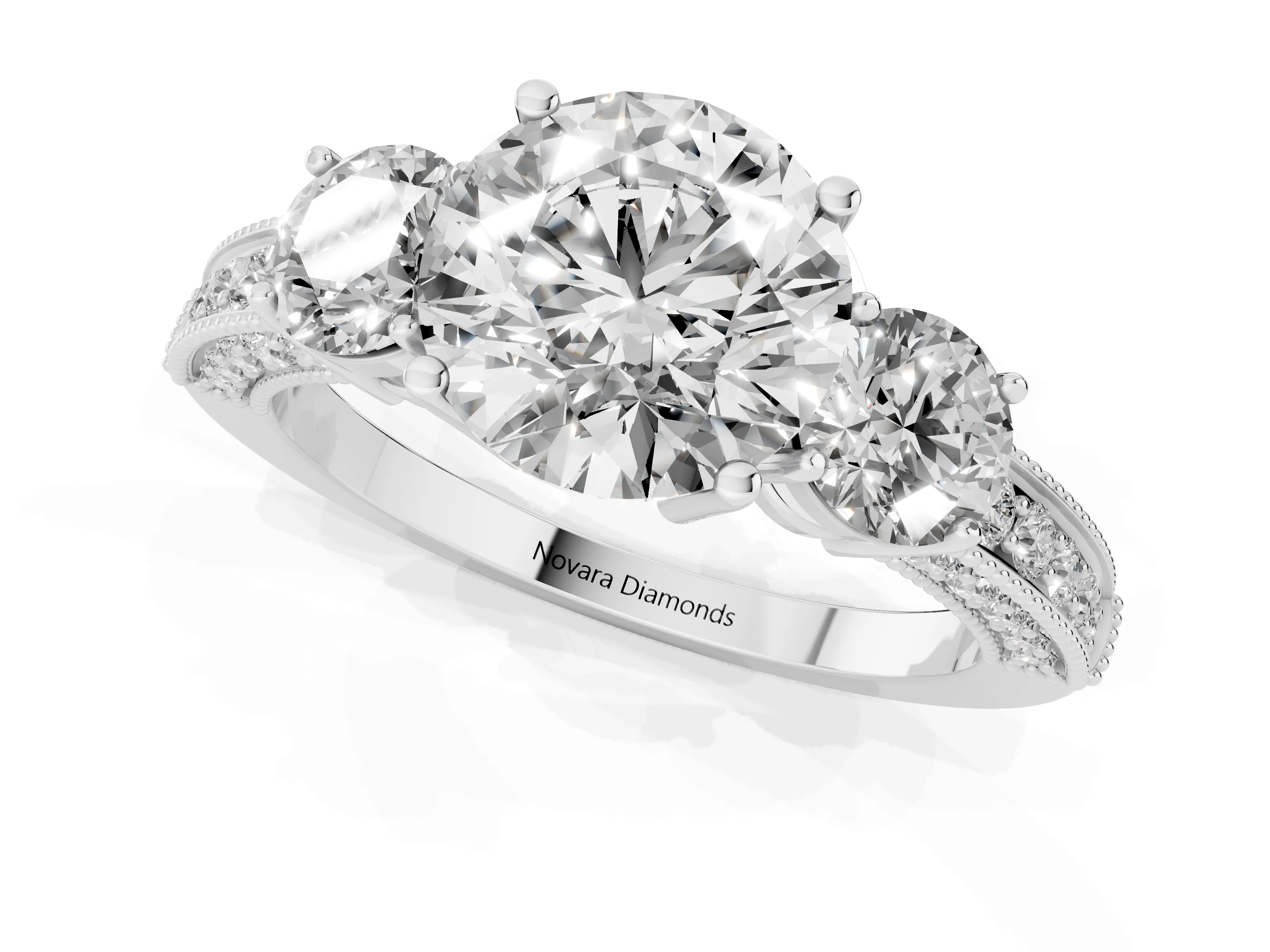 Round Cut Diamond Three-Stone Ring Set in White gold with Round Side Stones and Pavé Band