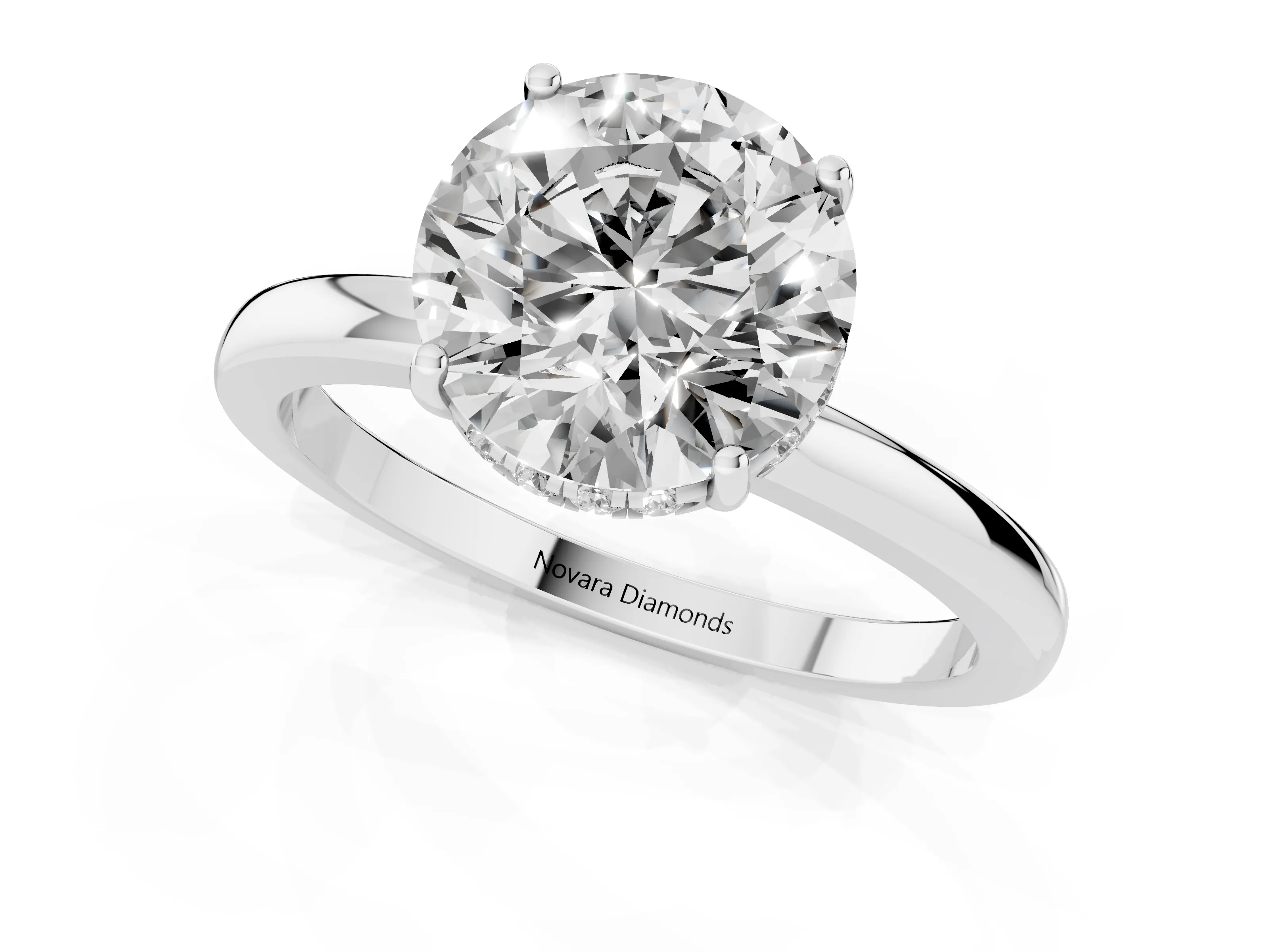 Round Cut Diamond Solitaire Ring Set in White gold with Plain Band and Prong Setting