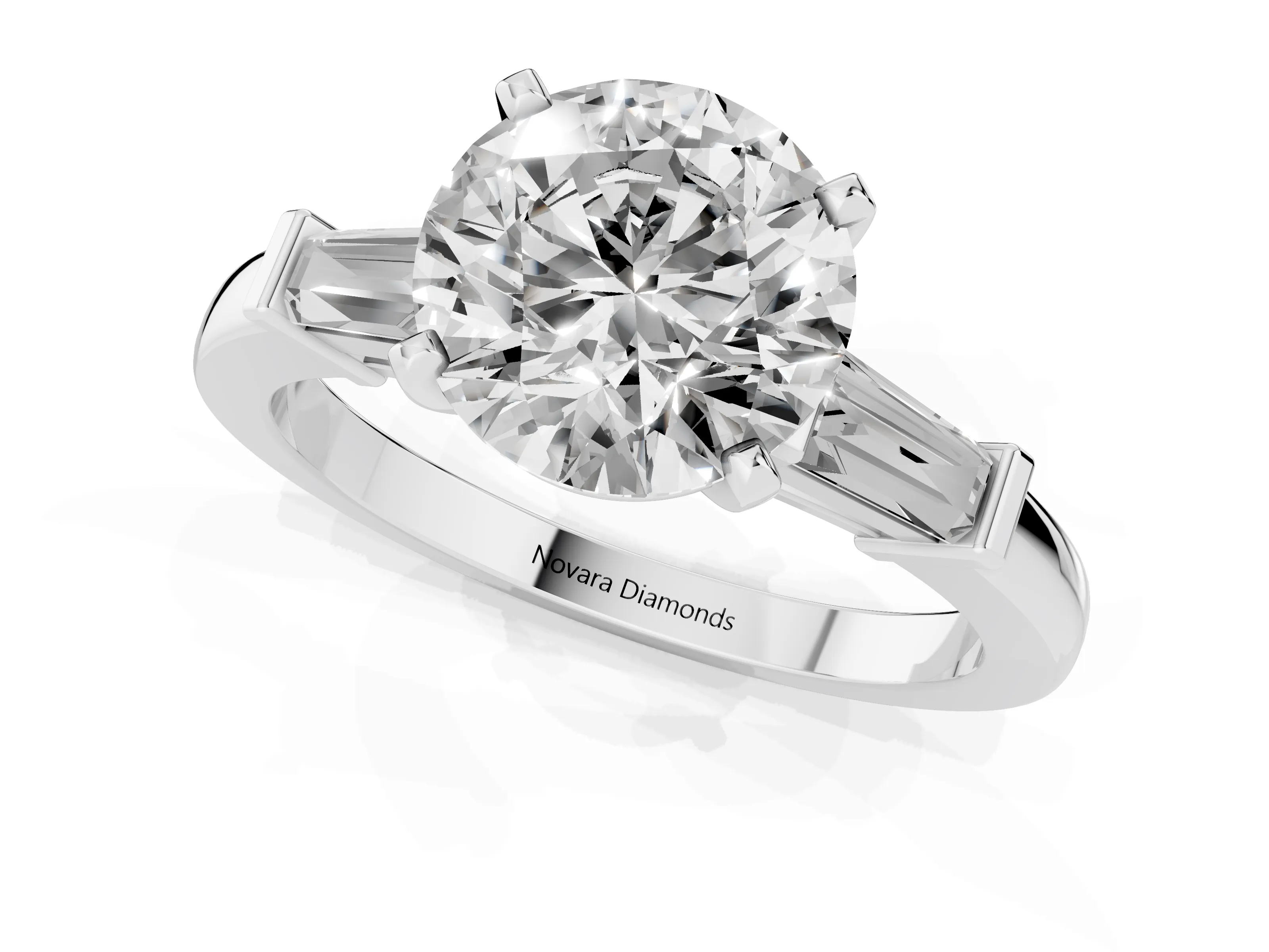 Round Cut Diamond Solitaire Ring Set in White gold with Tapered Baguette Accents and Prong Setting