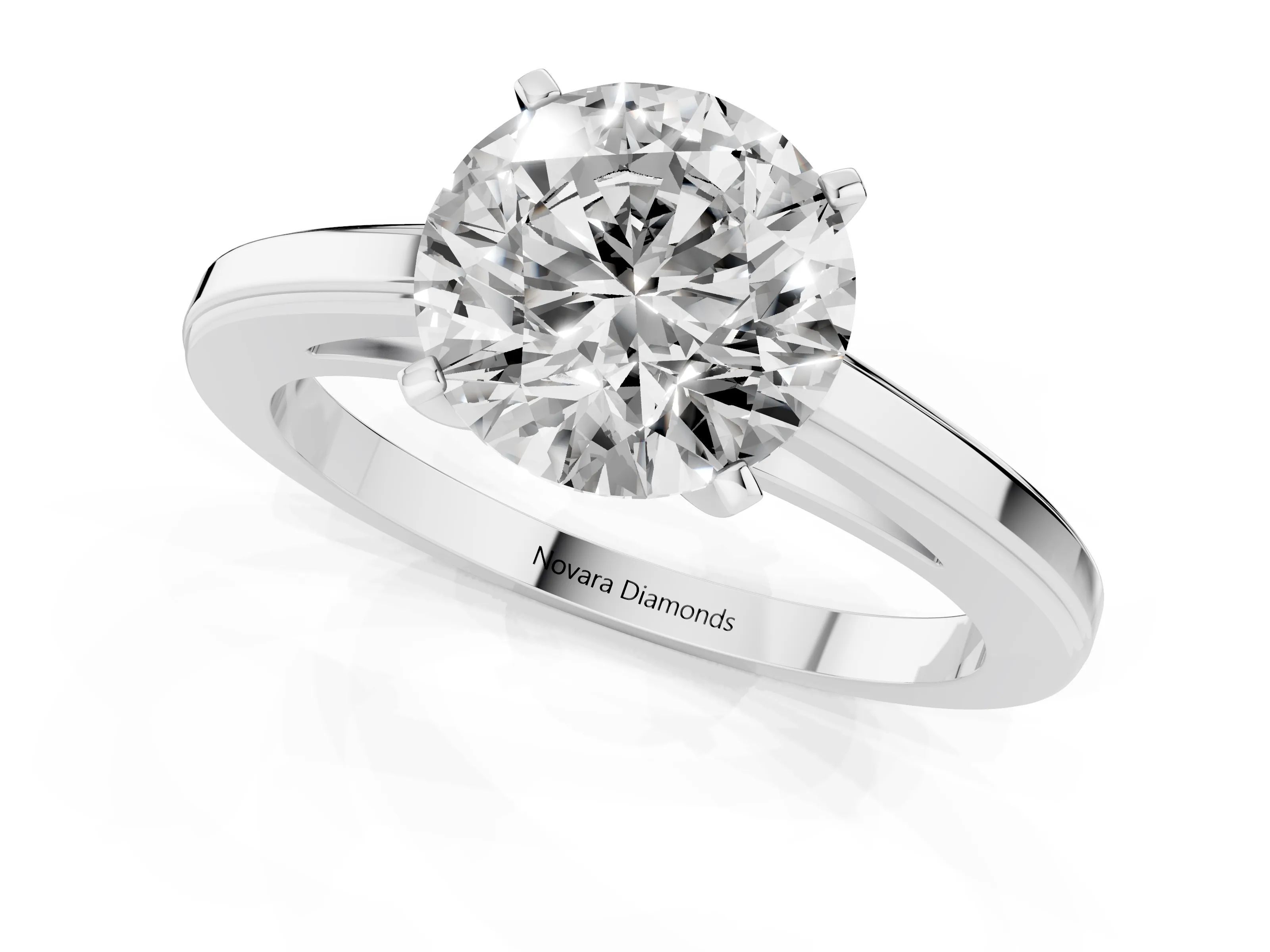 Round Cut Diamond Solitaire Ring Set in Platinum with Prong Setting and Classic Band