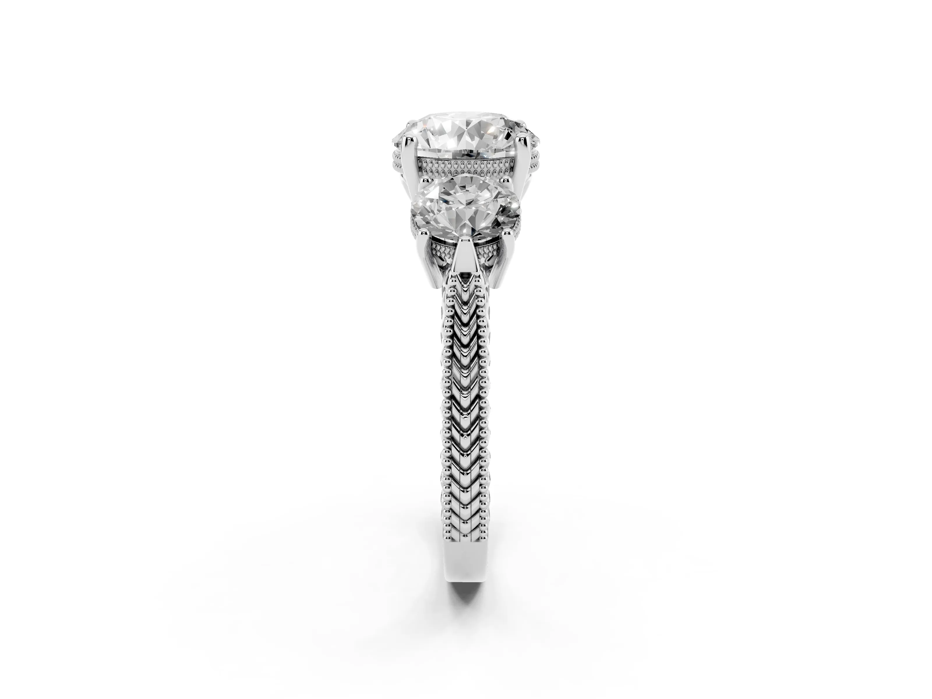 Round Cut Diamond Three-Stone Ring Set in Platinum with Milgrain Band