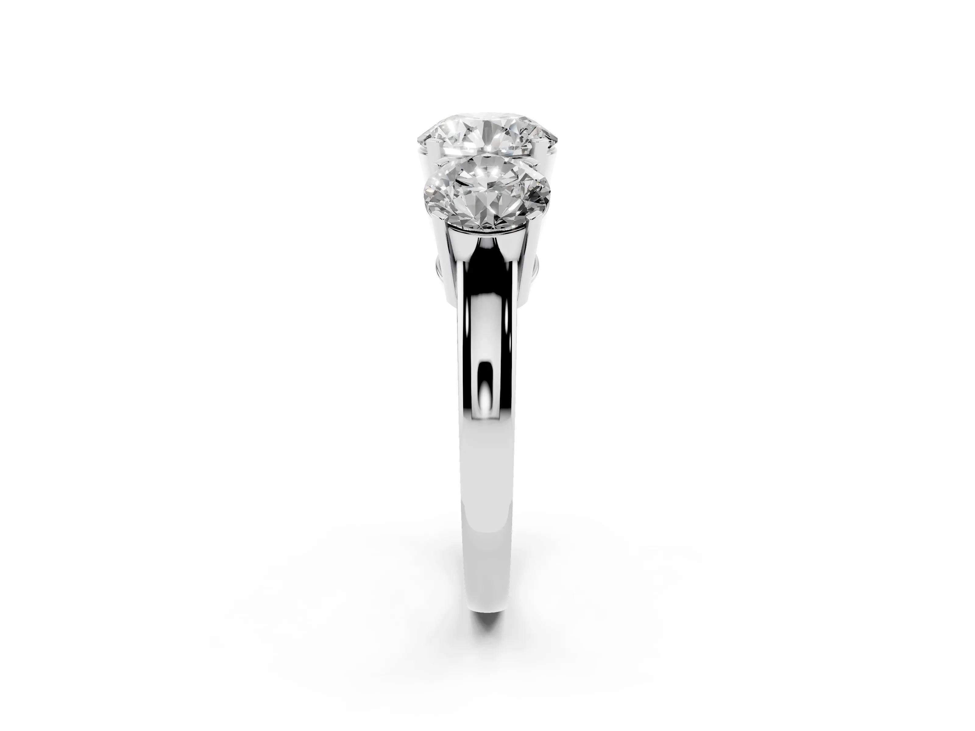 Round Cut Diamond Three-Stone Ring Set in Platinum with Channel-Set Band and Prong Settings