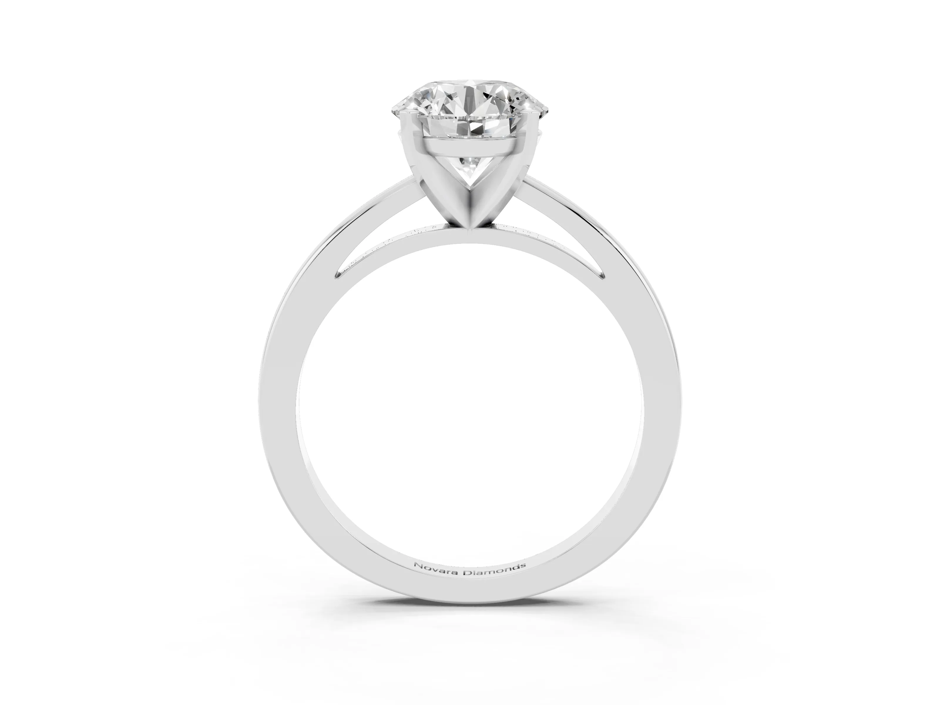 Round Cut Diamond Solitaire Engagement Ring Set in Silver with Prong Setting on a Classic Band