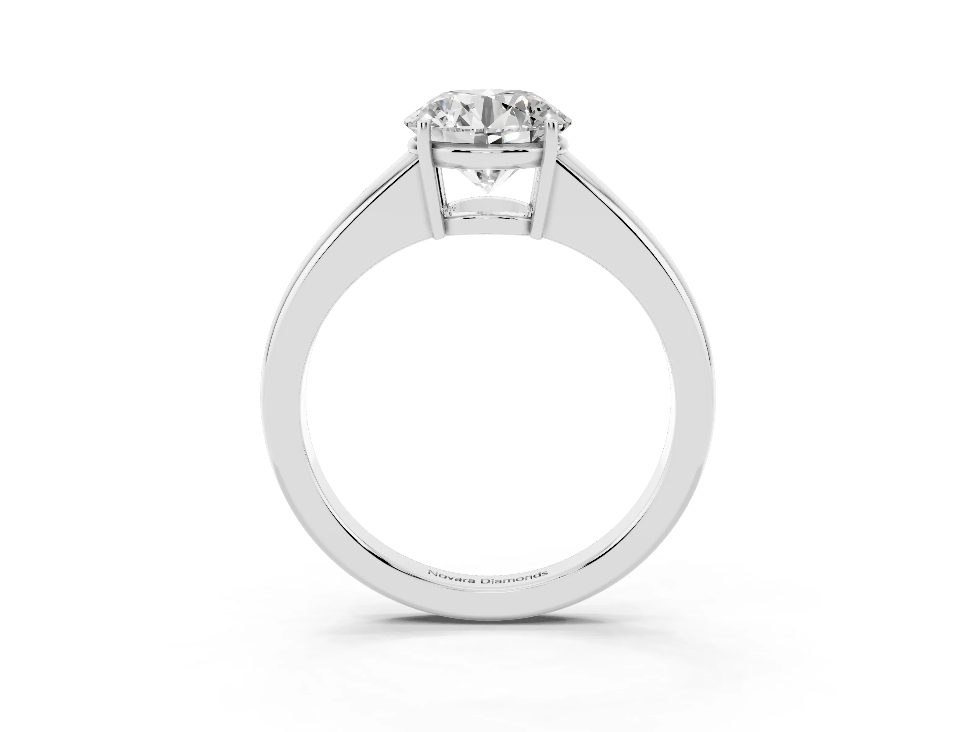 Round Cut Diamond Solitaire Ring Set in Silver with Tapered Band and Prong Setting
