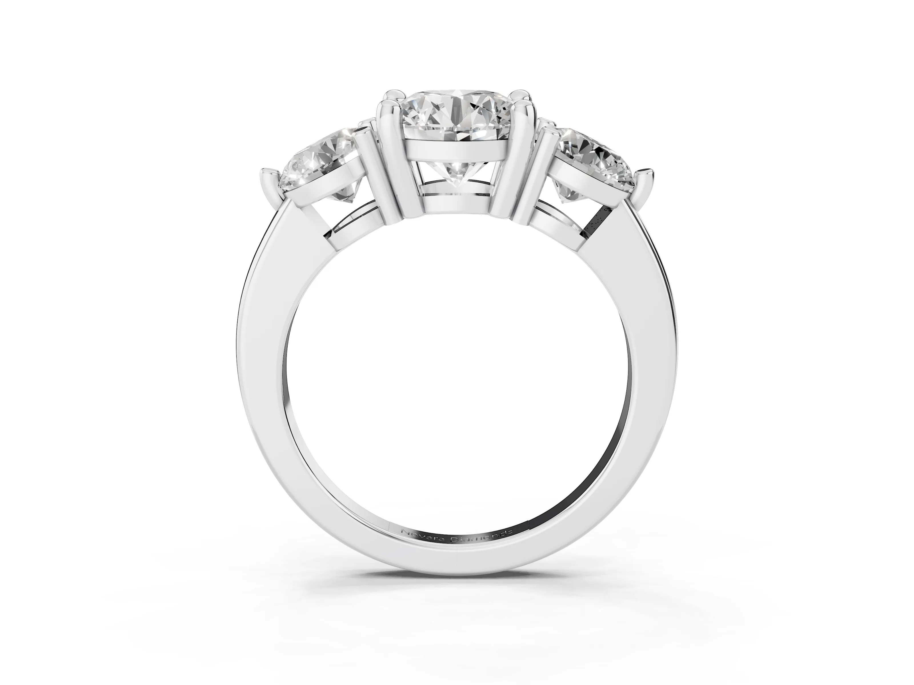 Round Cut Diamond Three-Stone Ring Set in Silver with Prong Setting and Classic Band