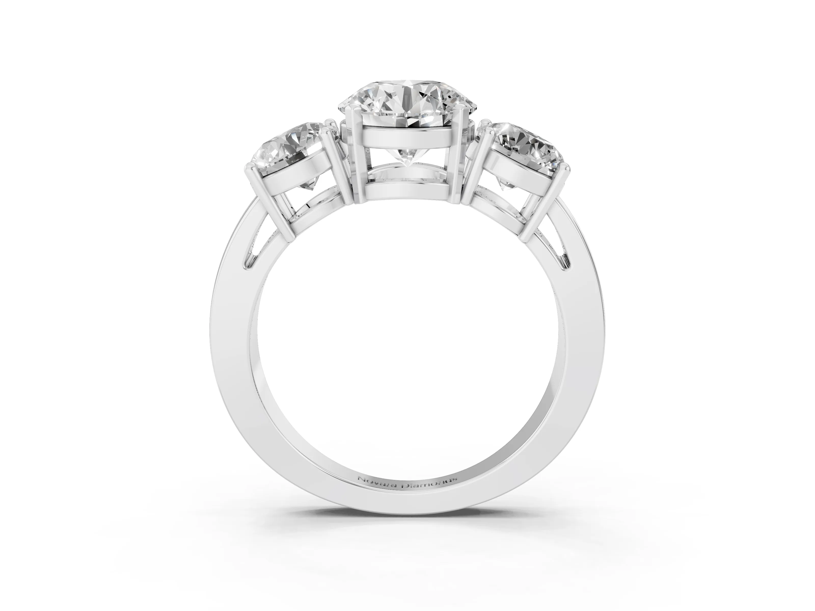 Round Cut Diamond Three-Stone Ring Set in White gold with Round Side Stones and Classic Band