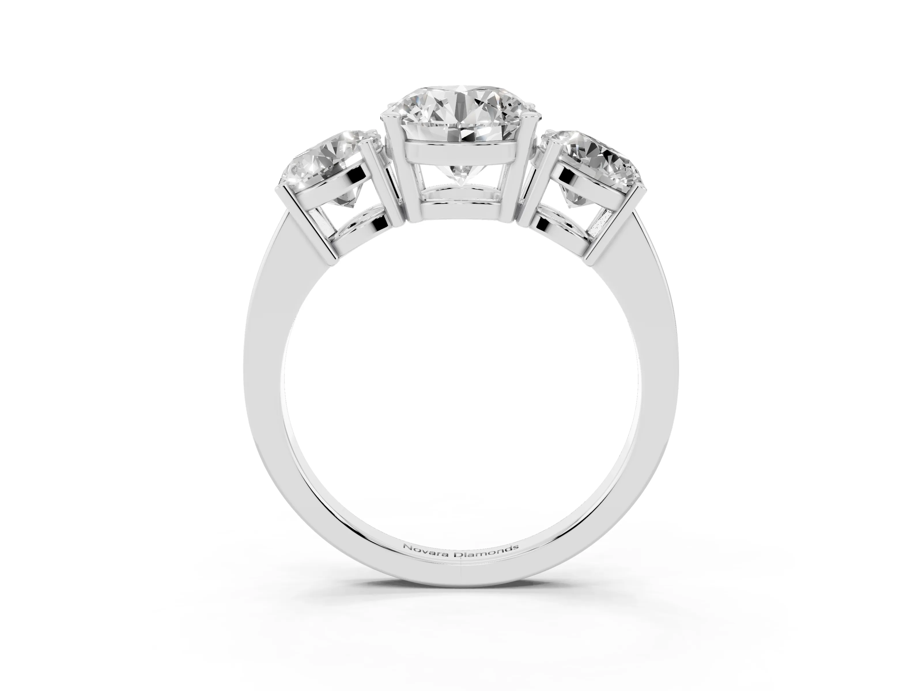 Round Cut Diamond Three-Stone Engagement Ring Set in Platinum with Flat Band