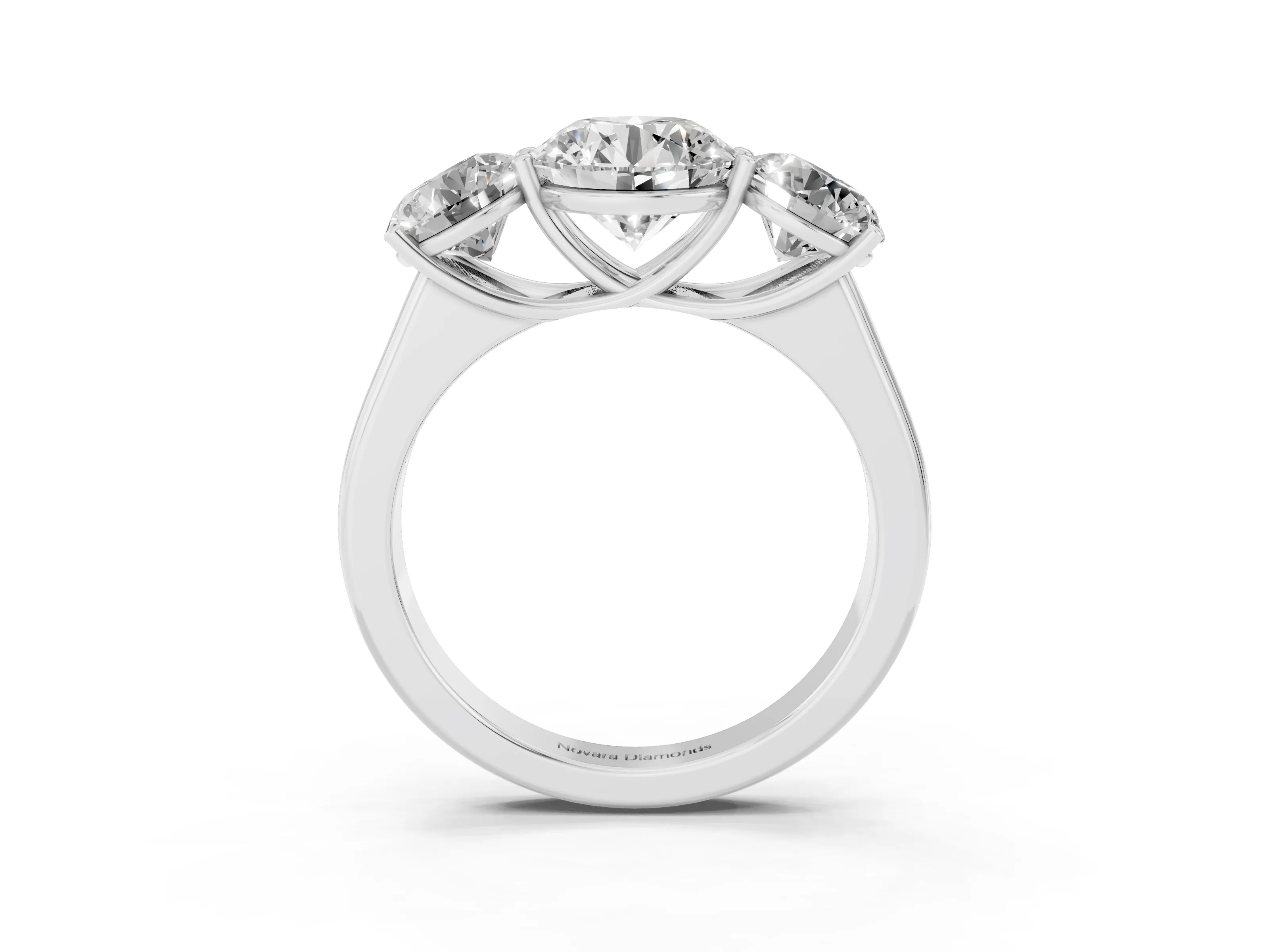 Round Cut Diamond Three-Stone Ring Set in Platinum with Plain Polished Band