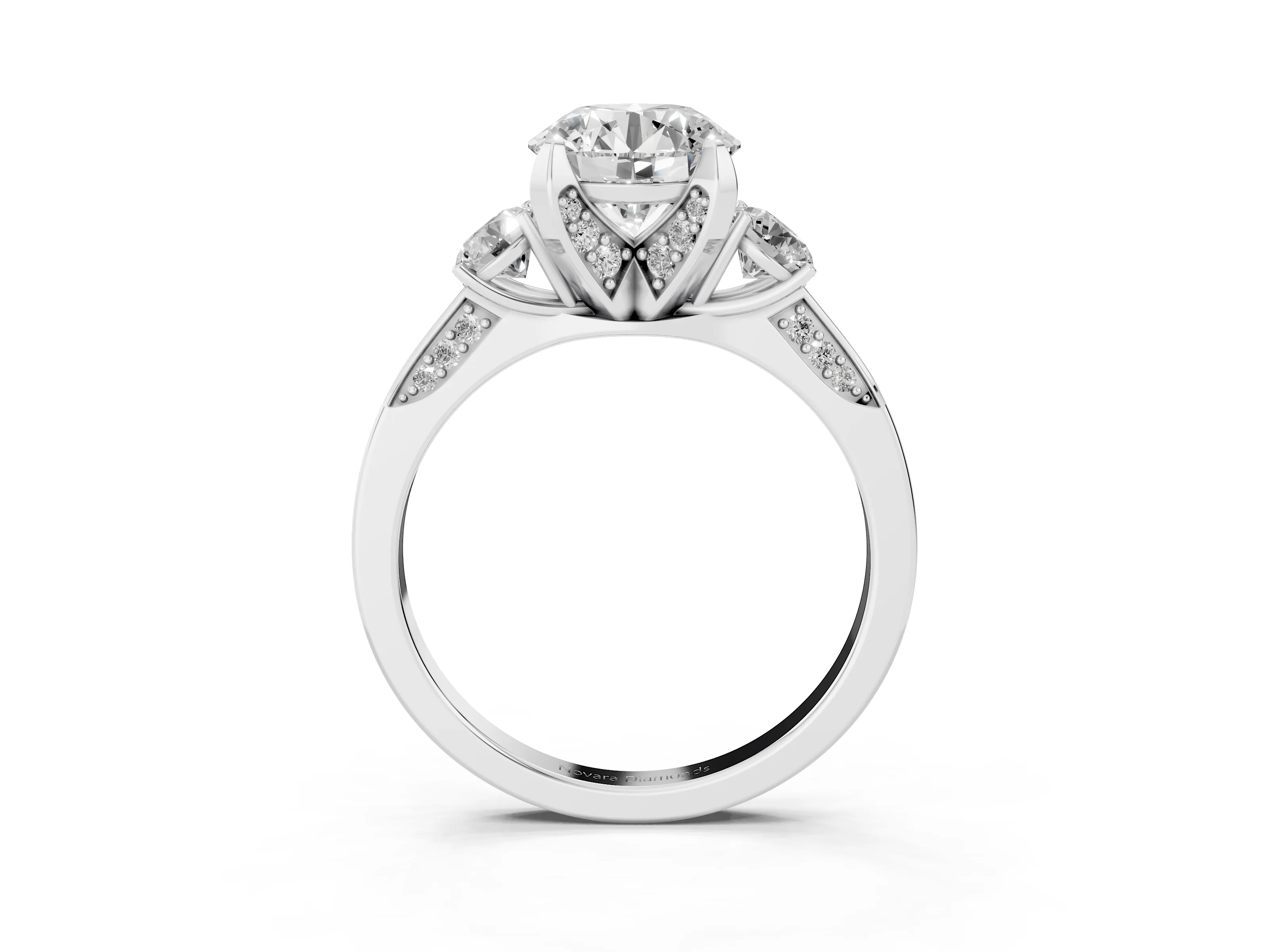 Round Cut Diamond Three-Stone Ring Set in Platinum with Pavé Band and Smaller Side Stones