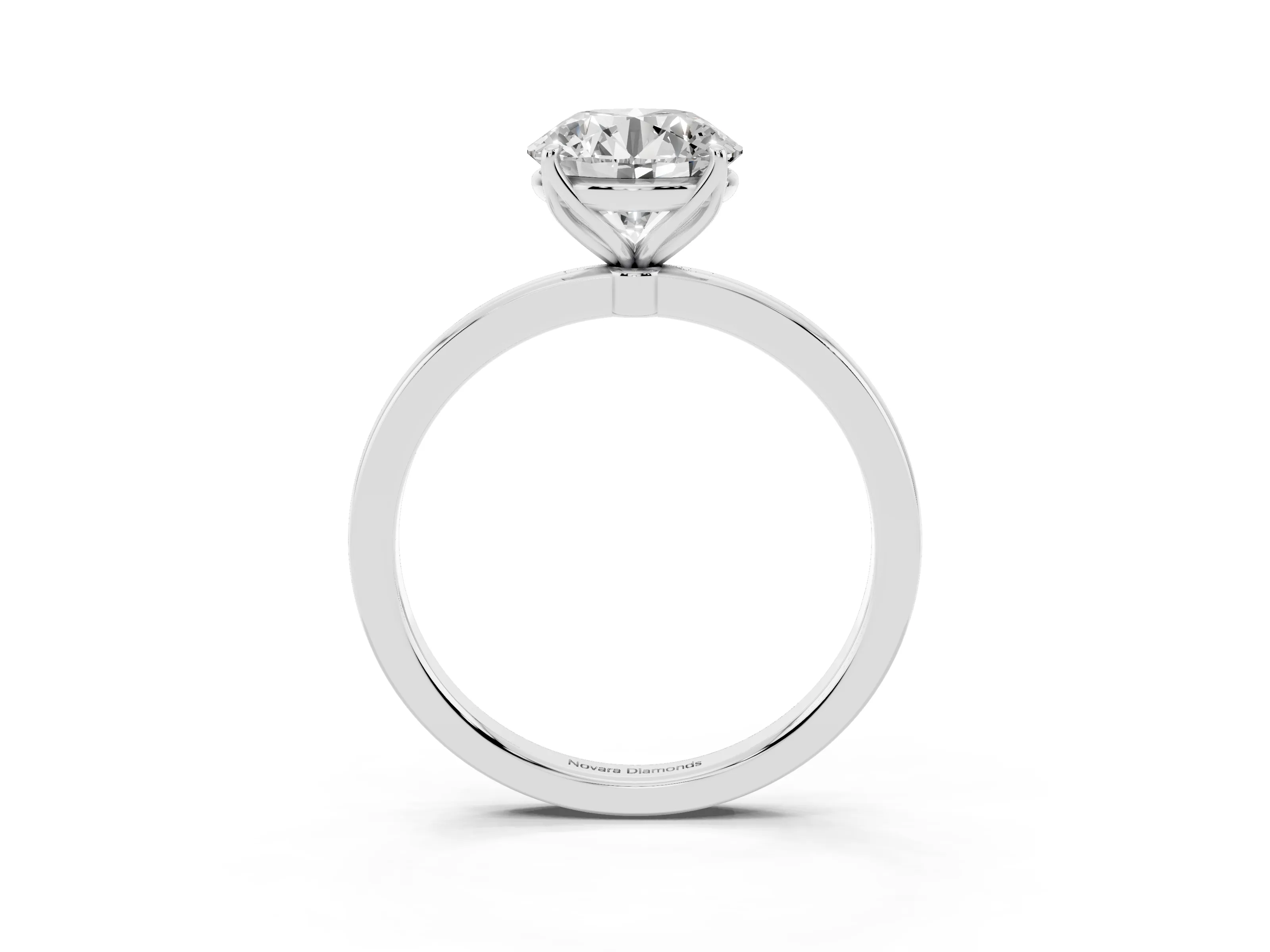 Round Cut Diamond Solitaire Ring Set in Silver with Prong Setting and Thin Polished Band