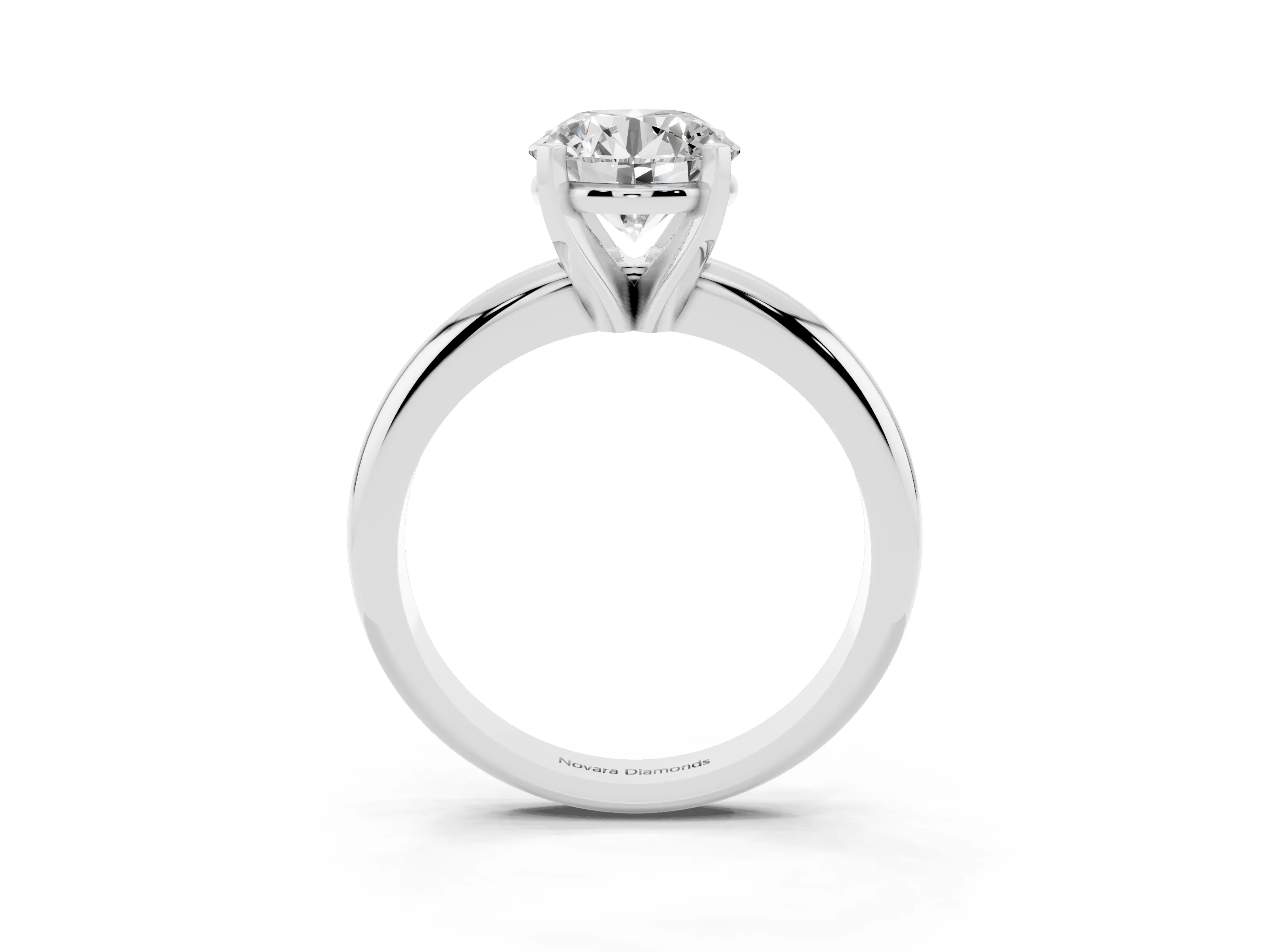 Round Cut Diamond Solitaire Engagement Ring Set in Platinum with Round Band and Prong Setting