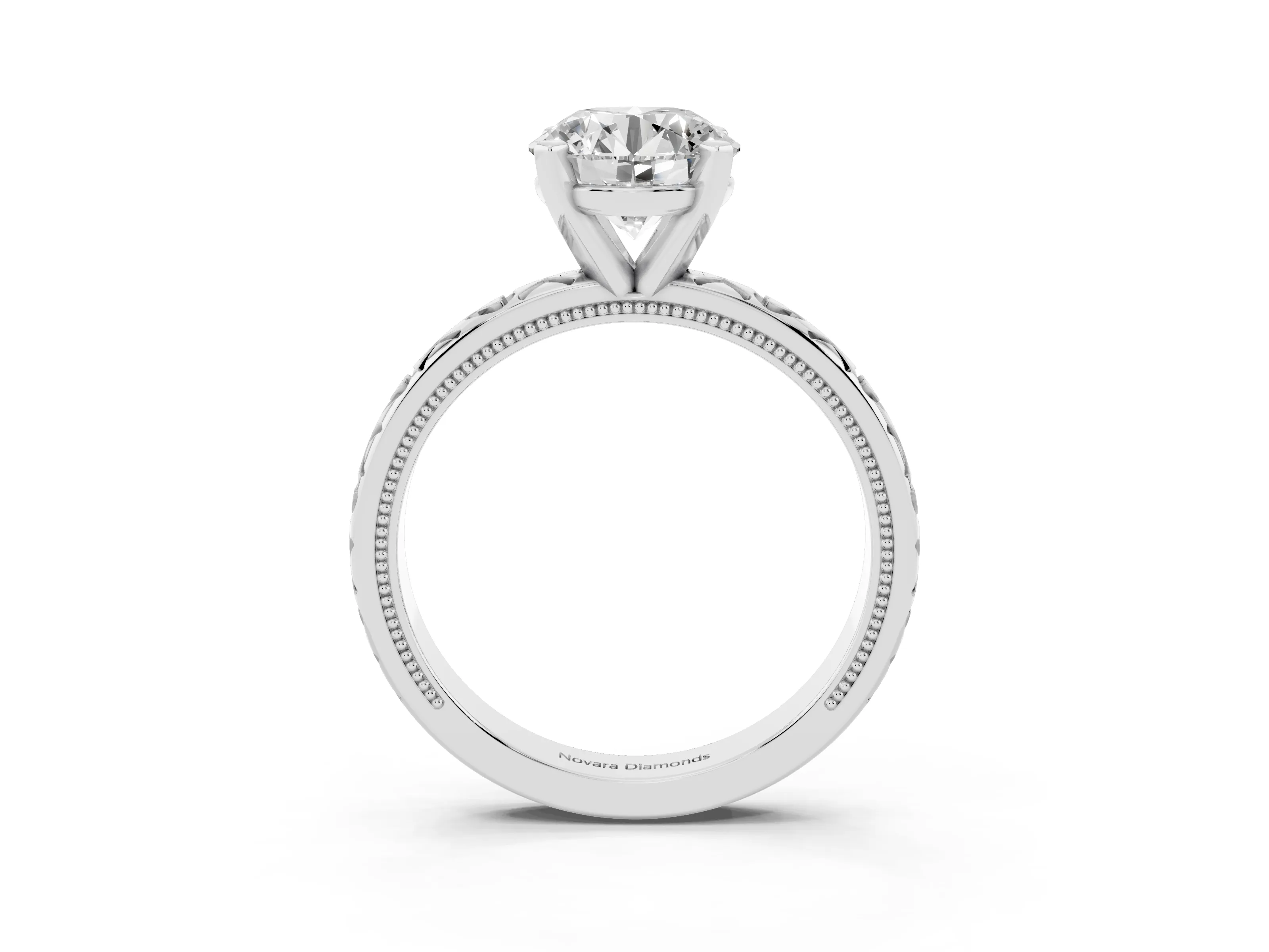 Round Cut Diamond Solitaire Engagement Ring Set in Platinum with XO Engraved Band and Prong Setting