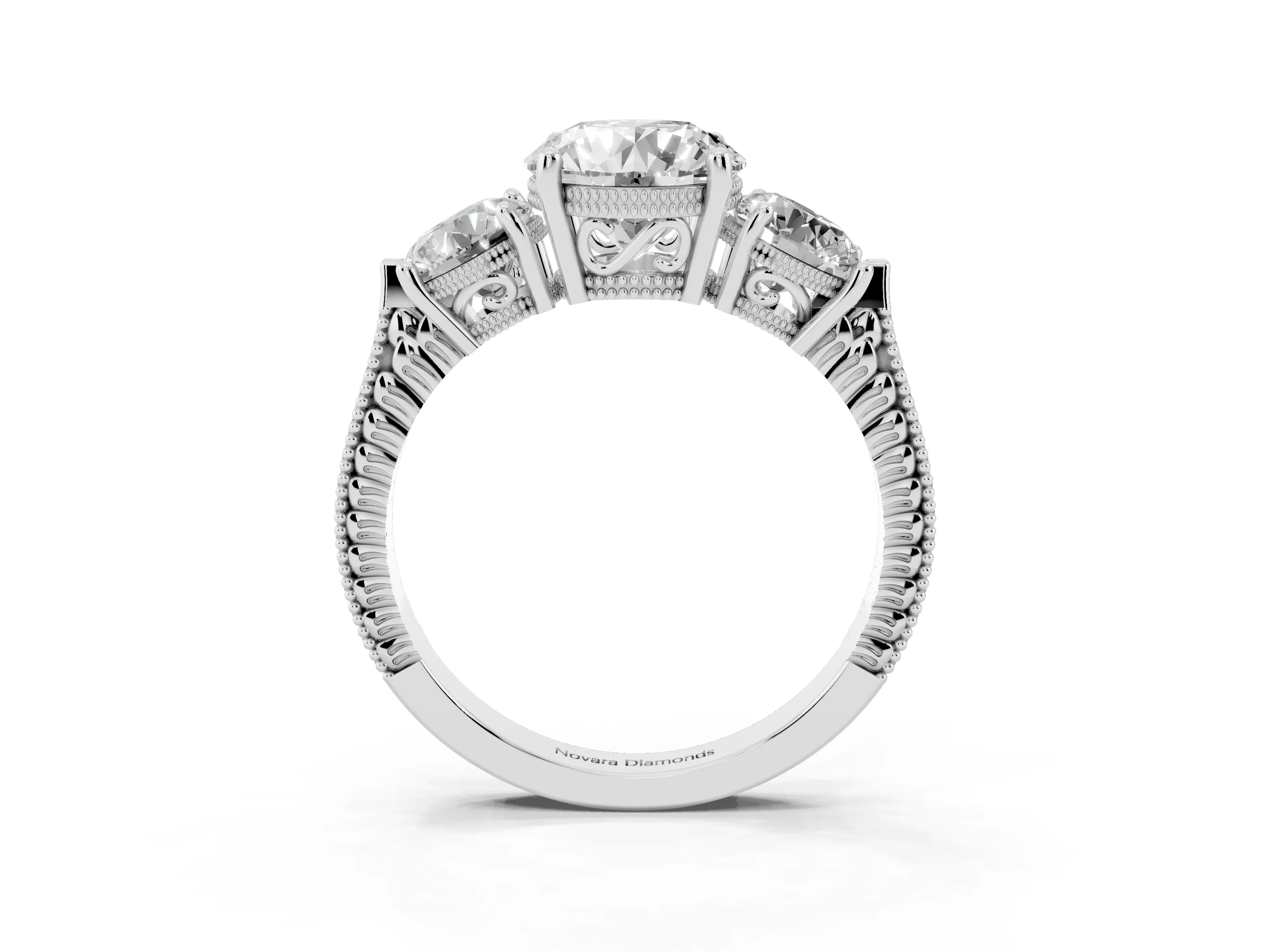 Round Cut Diamond Three-Stone Ring Set in Platinum with Milgrain Band