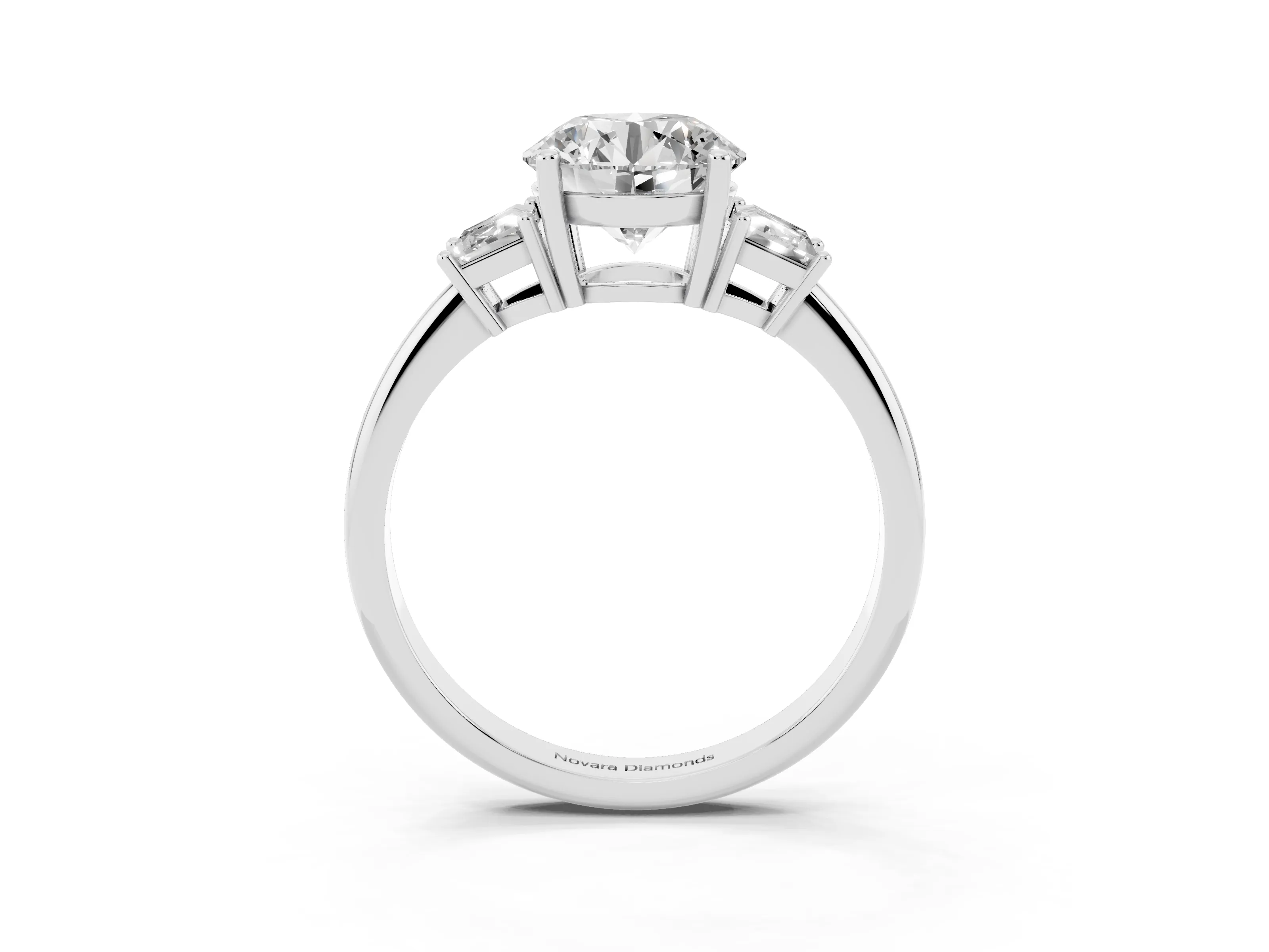 Round Cut Diamond Three-Stone Ring Set in White gold with Trapezoid Side Stones and Prong Setting
