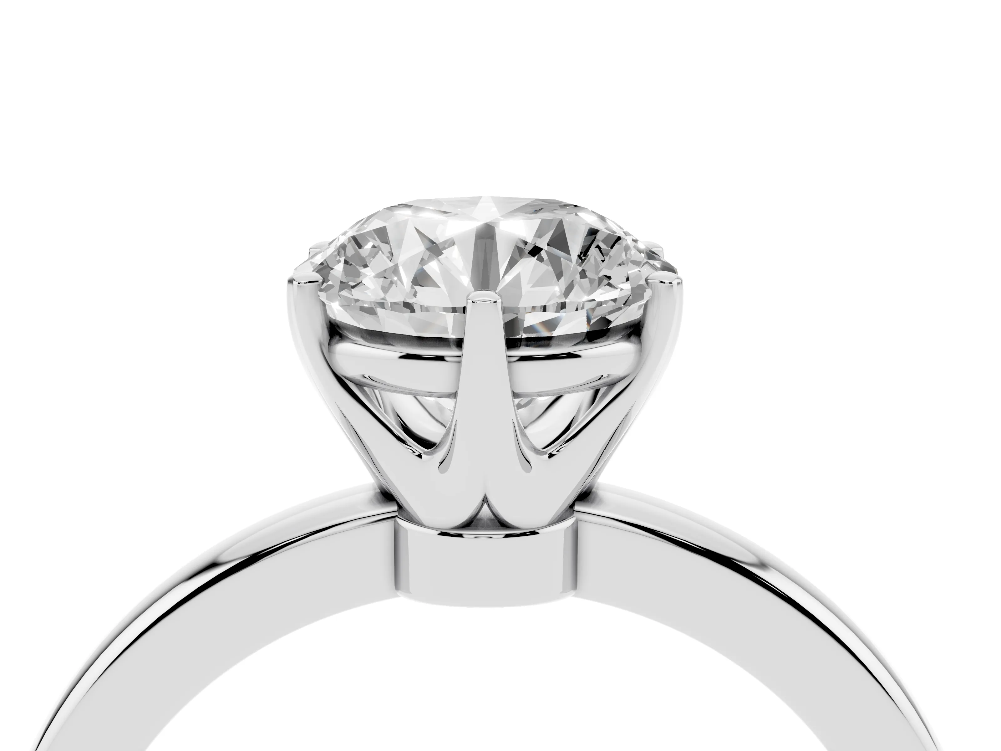 Round Cut Diamond Solitaire Ring Set in Silver with Raised Prong Setting on a Classic Band
