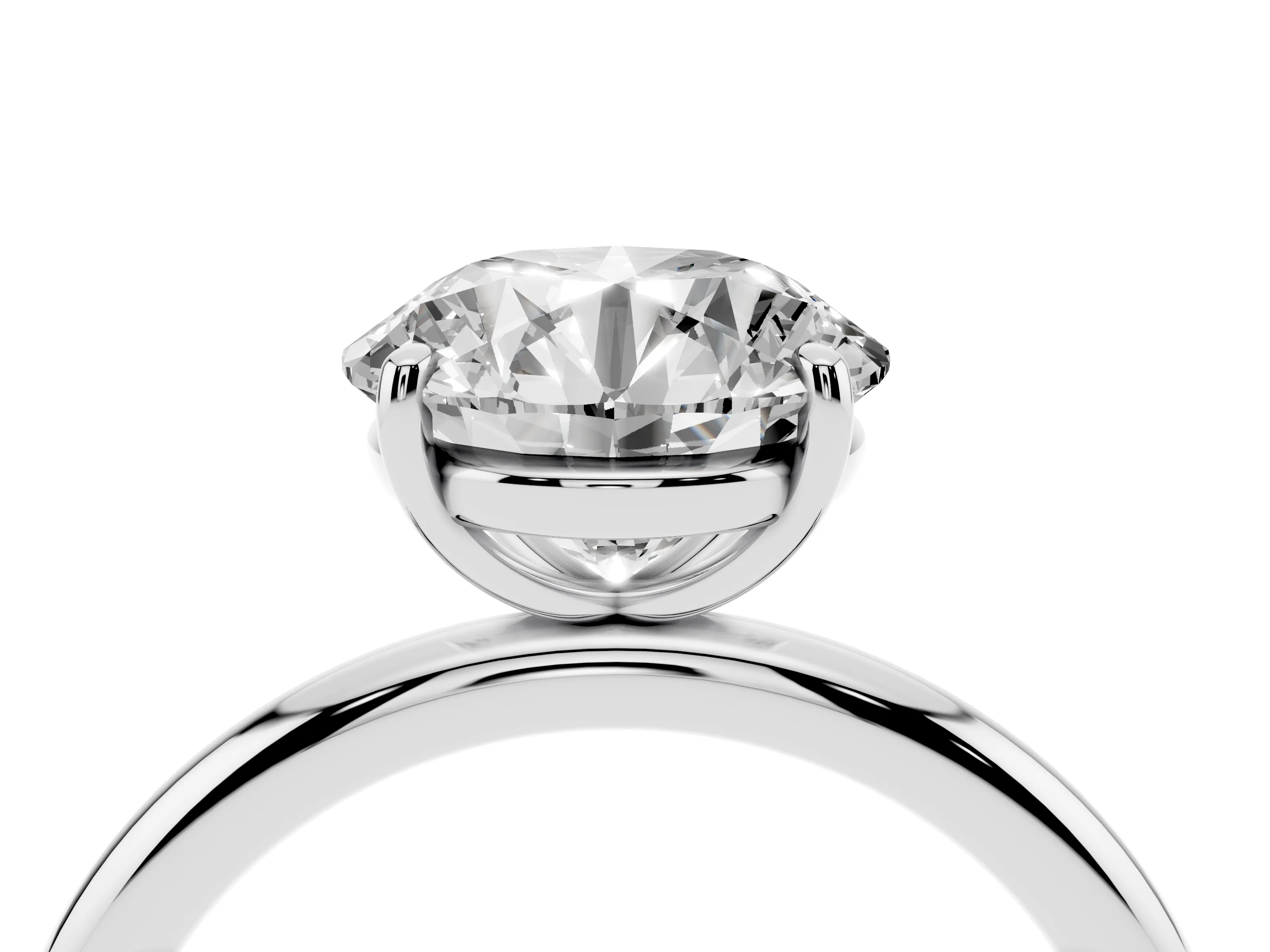 Round Cut Diamond Solitaire Ring Set in Silver with Prong Setting on a Polished Plain Band
