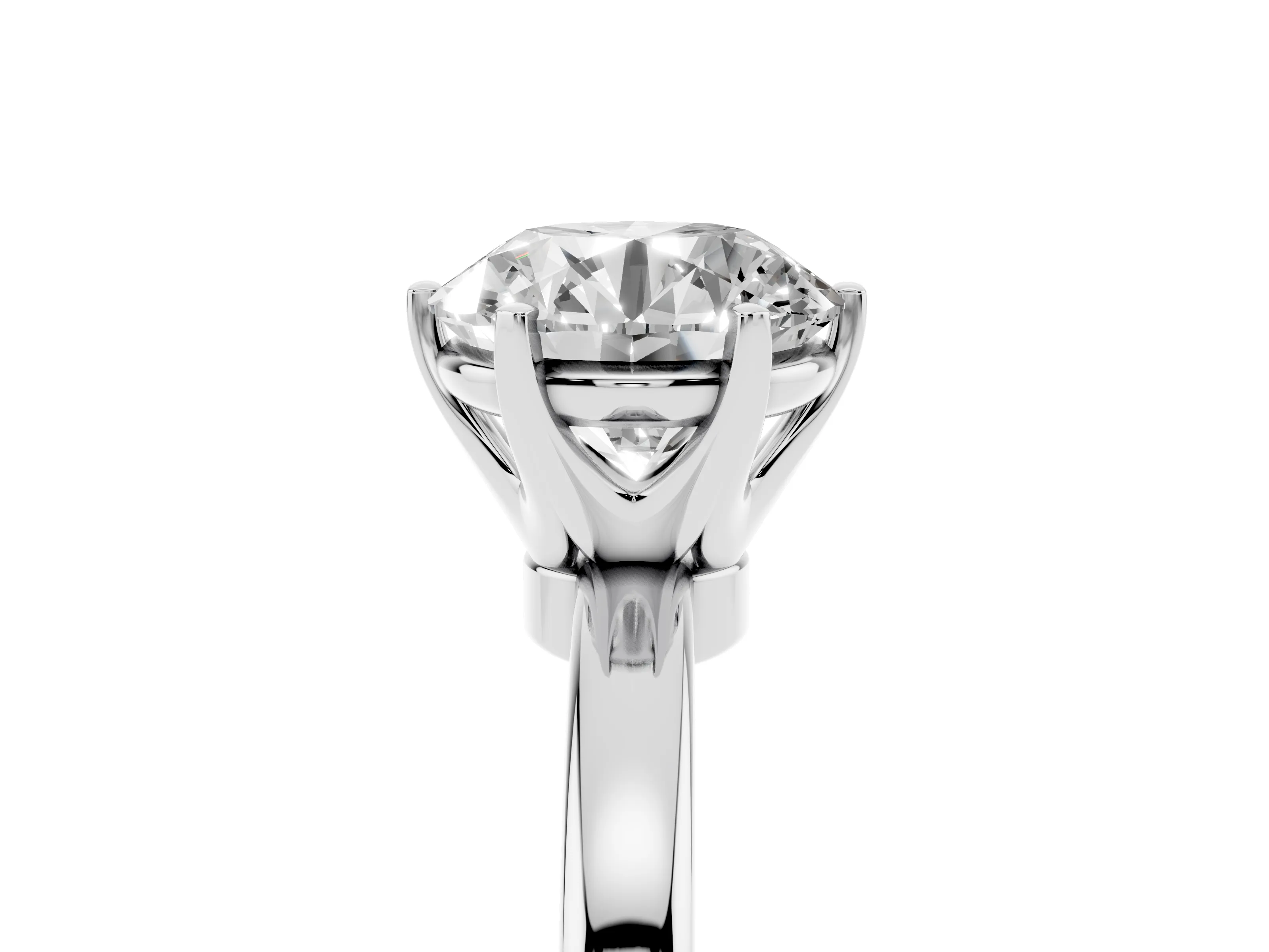 Round Cut Diamond Solitaire Ring Set in Silver with Raised Prong Setting on a Classic Band